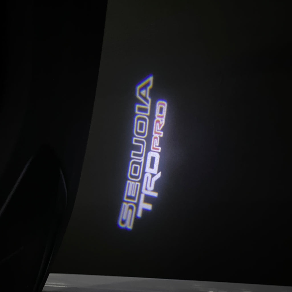 TOYOTA  SEQUOIA LOGO PROJECROTR LIGHTS  (quantity 1 = 1 sets/2 door lights) Nr.0G29