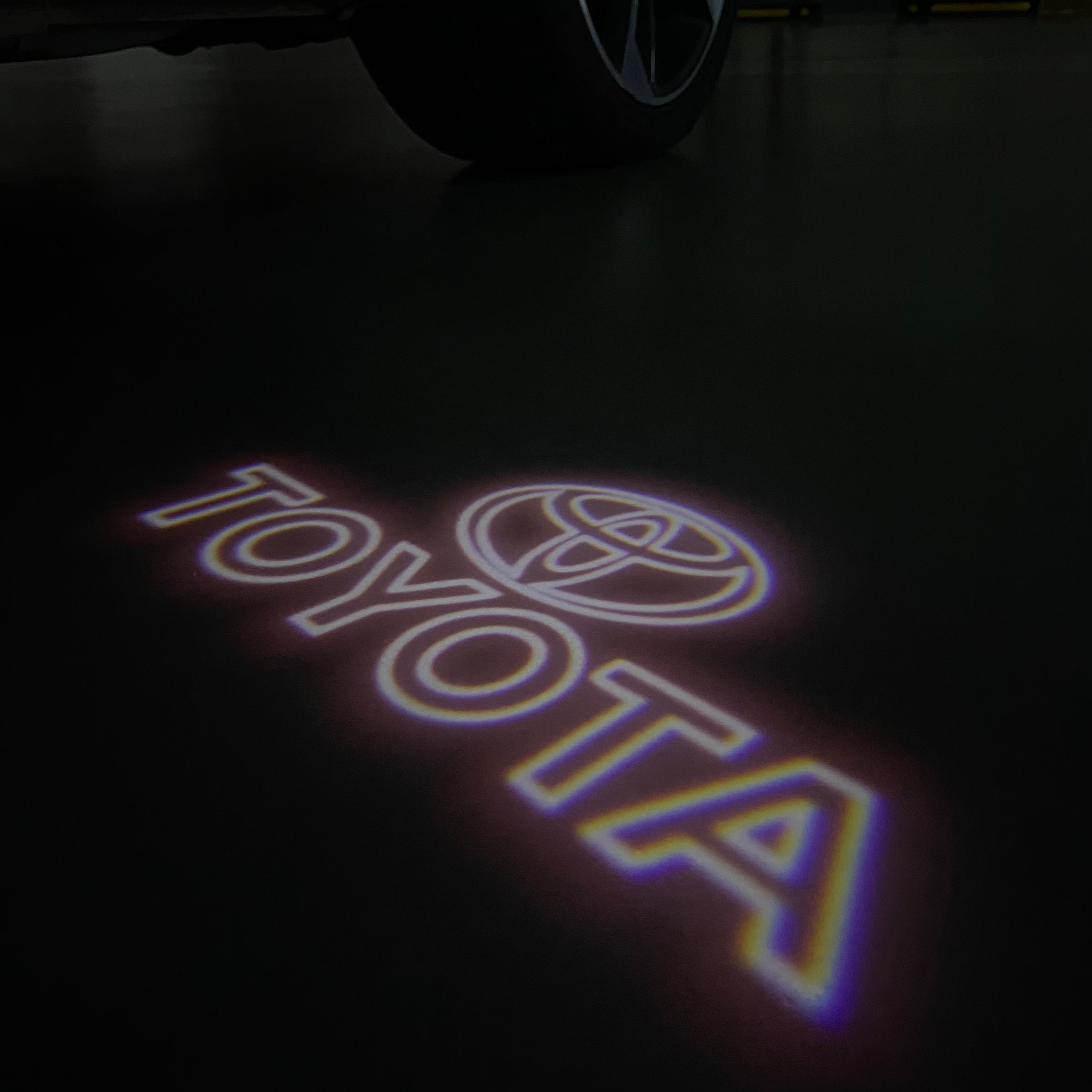 TOYOTA  ORIGINAL LOGO PROJECROTR LIGHTS  (quantity 1 = 1 sets/2 door lights) Nr.0G44
