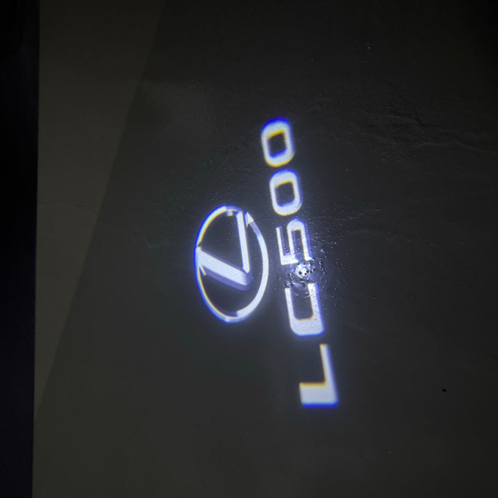 LEXUS LOGO PROJECTOR LIGHTS Nr.01 (الكمية 1 = 1 مجموعة / 2 أضواء باب)