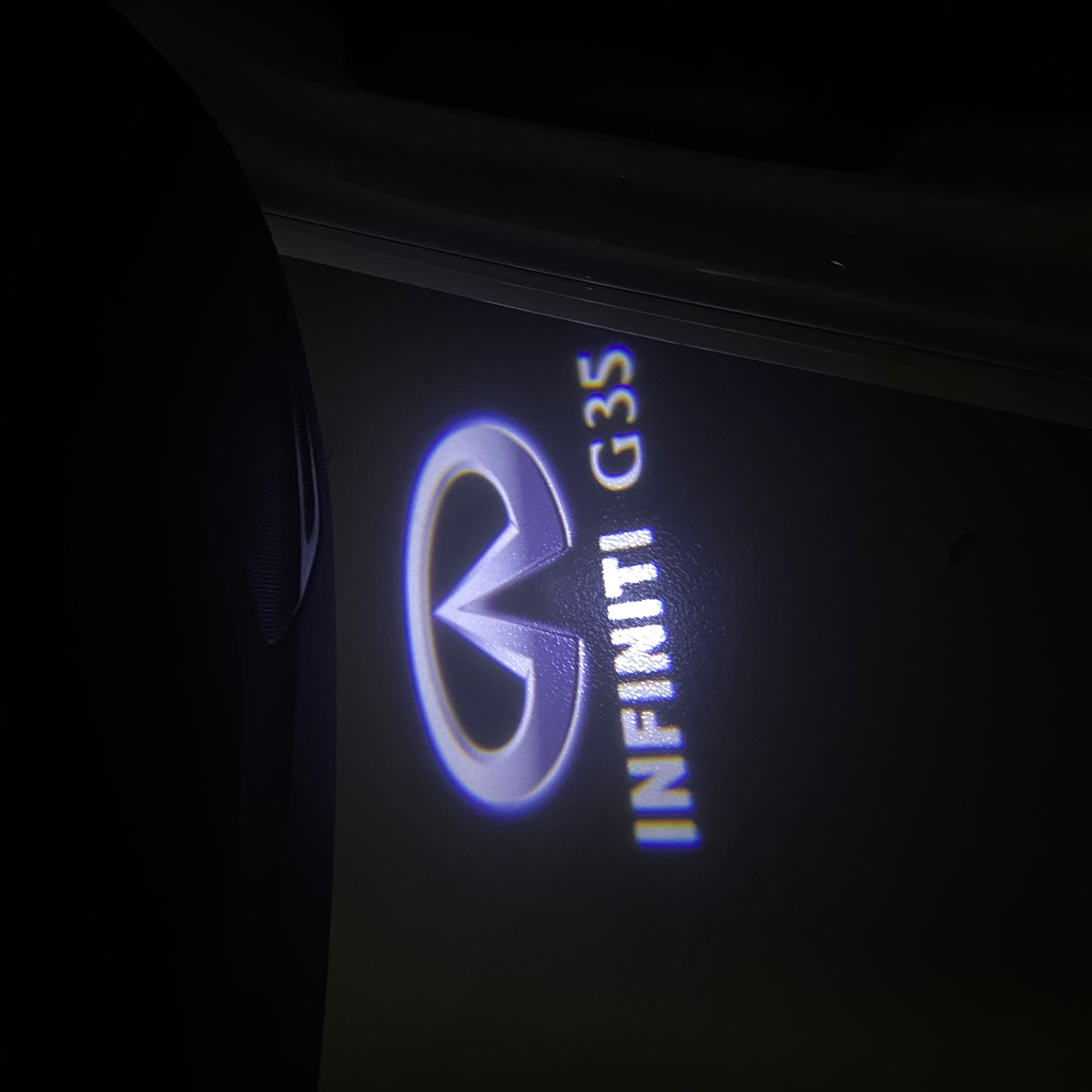 INFINITI G35 LOGO PROJECROTR LIGHTS Nr.38 (quantity 1 = 1 sets/2 door lights)