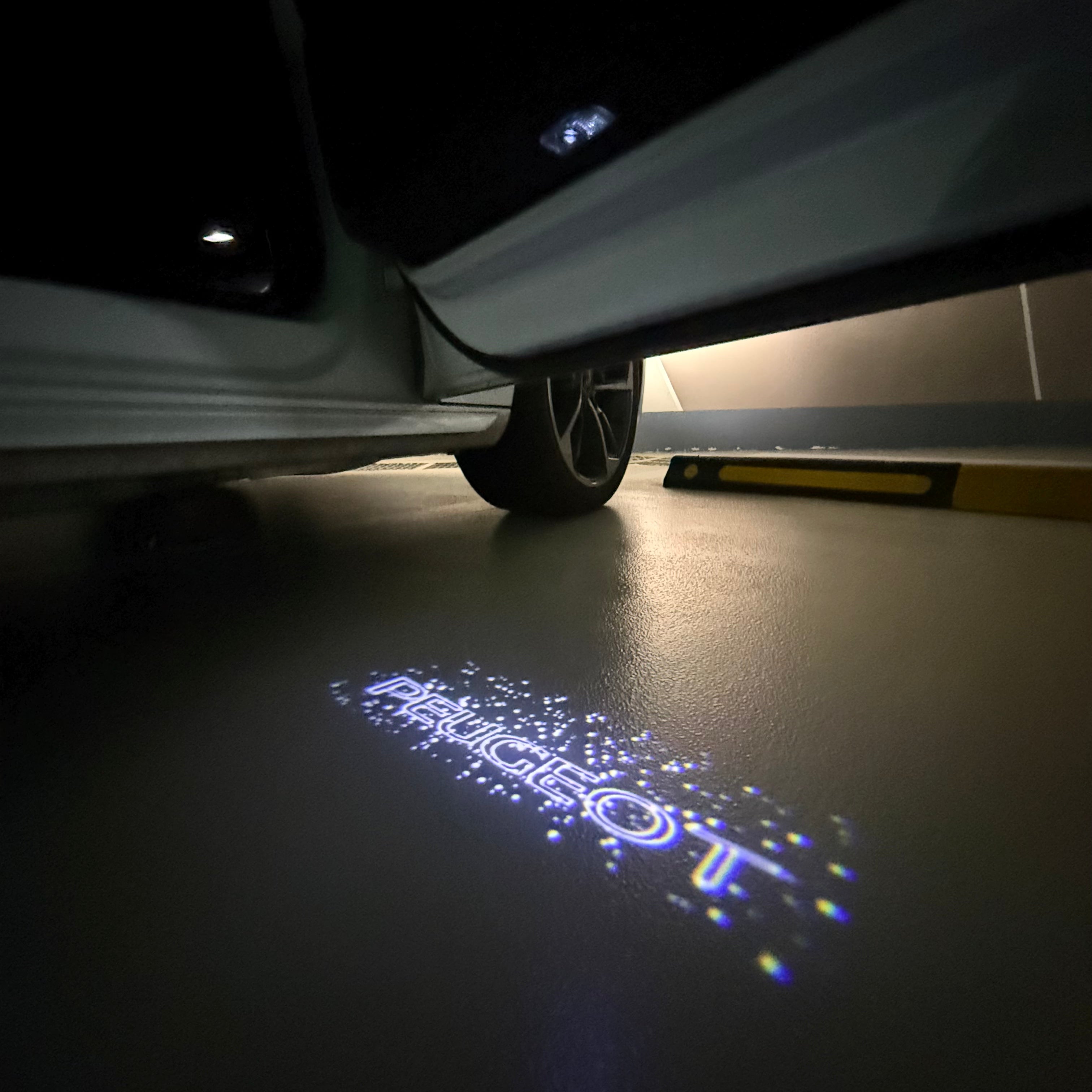 PEUGEOT ORIGINAL  LOGO PROJECTOT LIGHTS (quantity 1 = 1 sets/2 door lights) Nr.6024q72