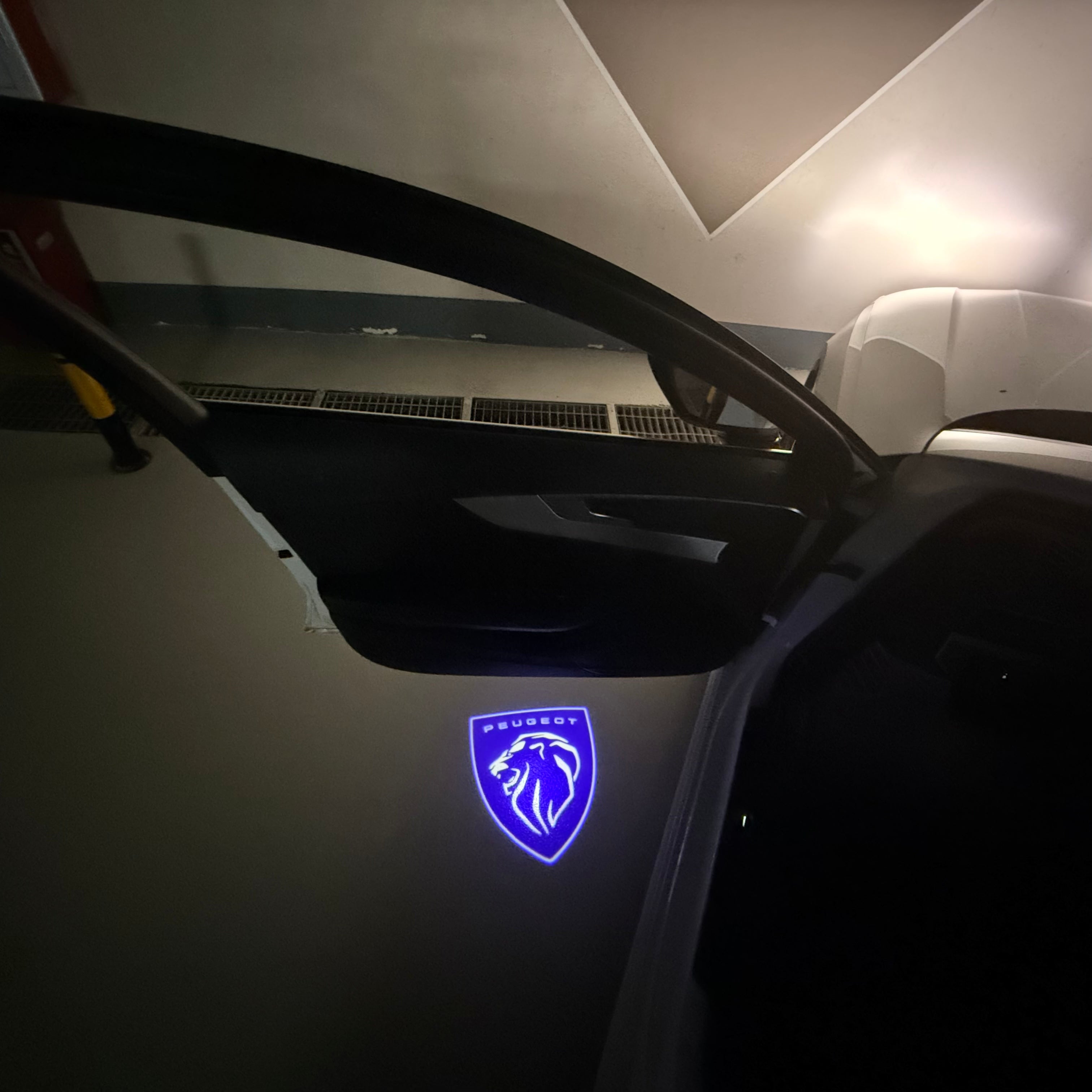 PEUGEOT ORIGINAL  LOGO PROJECTOT LIGHTS (quantity 1 = 1 sets/2 door lights) Nr.6024q74