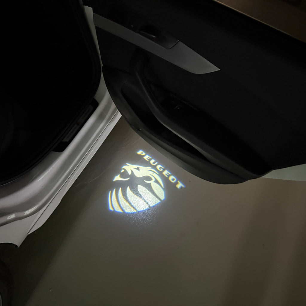PEUGEOT ORIGINAL  LOGO PROJECTOT LIGHTS (quantity 1 = 1 sets/2 door lights) Nr.6024q67