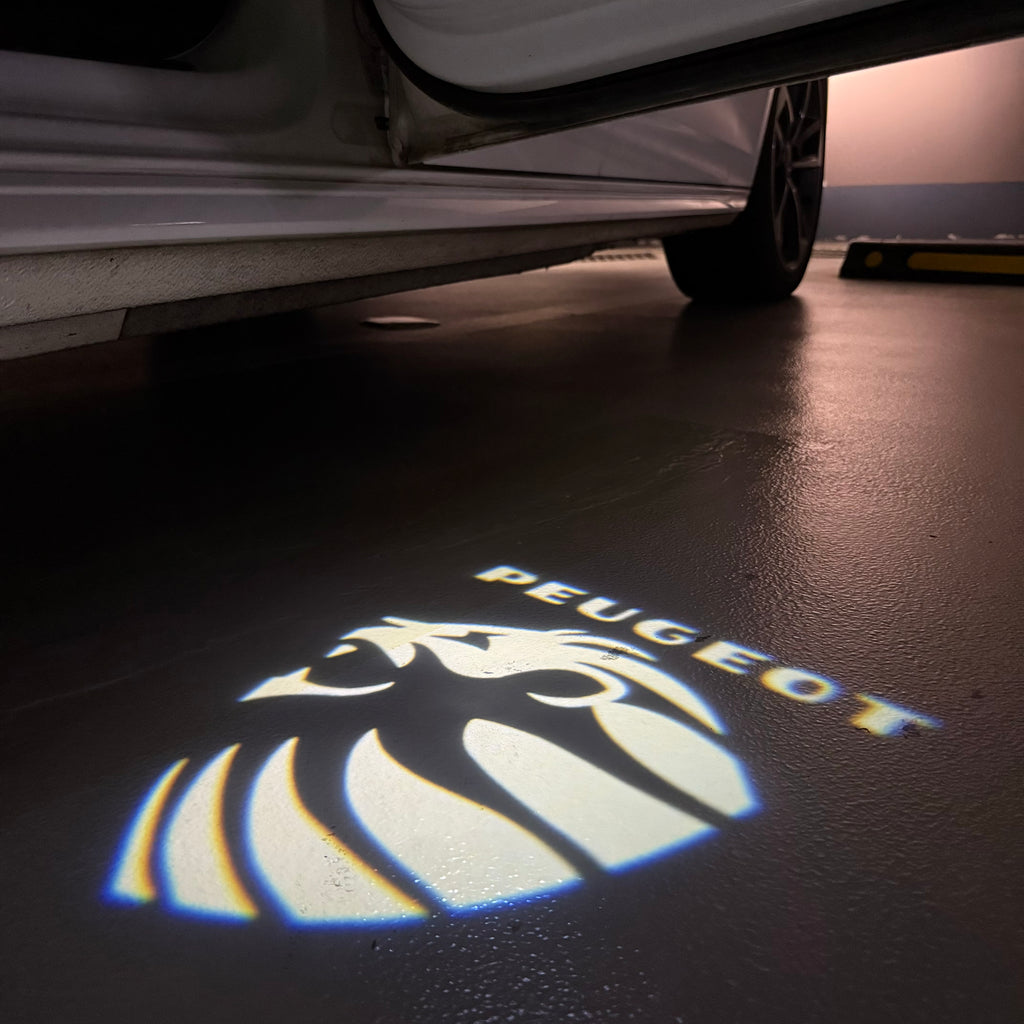 PEUGEOT ORIGINAL  LOGO PROJECTOT LIGHTS (quantity 1 = 1 sets/2 door lights) Nr.6024q67