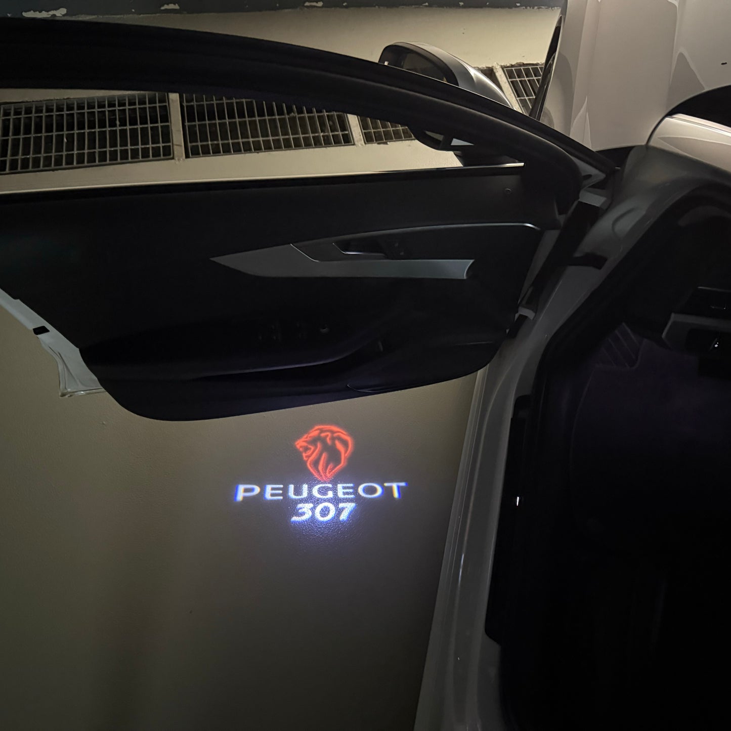 PEUGEOT  307   LOGO PROJECTOT LIGHTS (quantity 1 = 1 sets/2 door lights) Nr.6024q22
