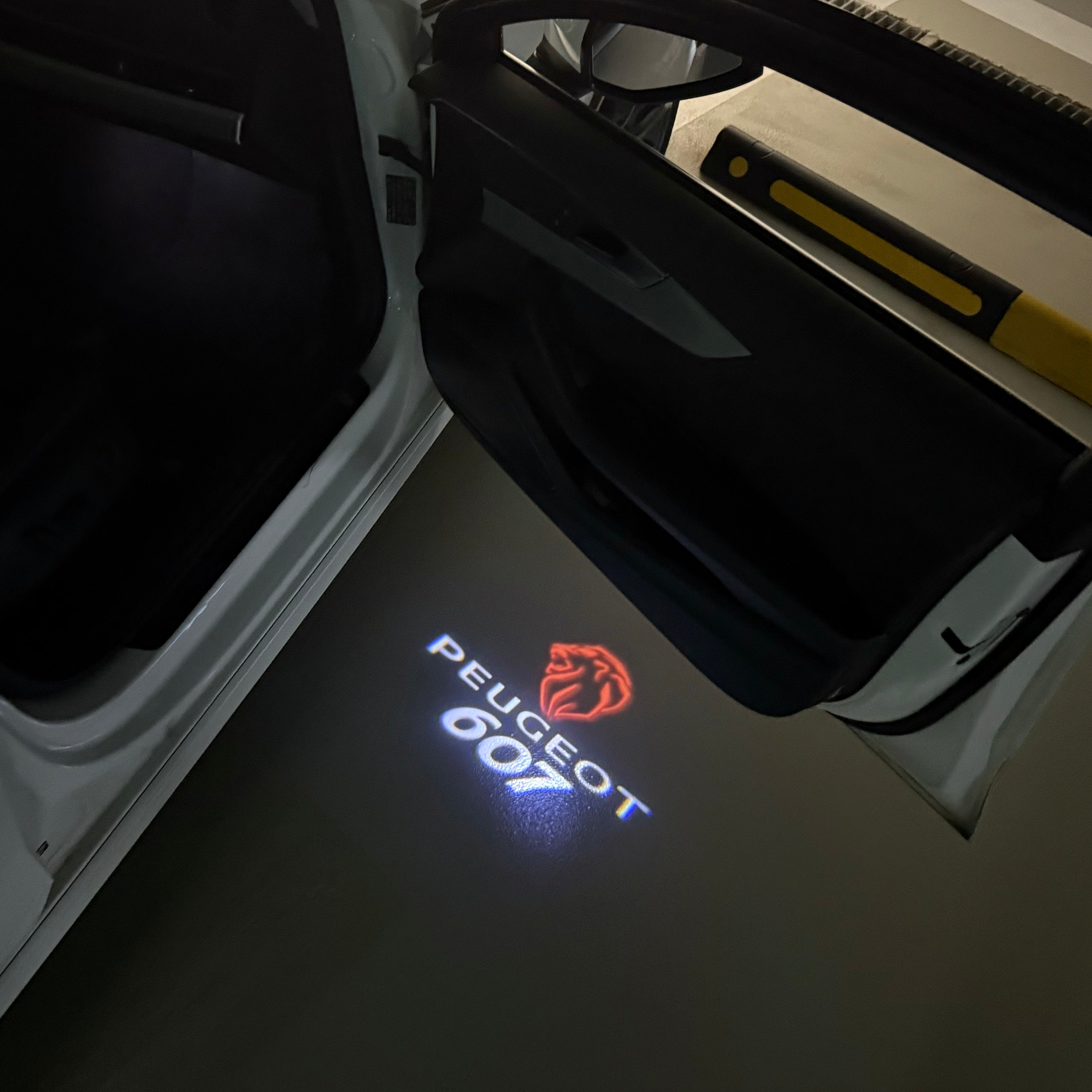PEUGEOT 607  LOGO PROJECTOT LIGHTS (quantity 1 = 1 sets/2 door lights) Nr.6024q52