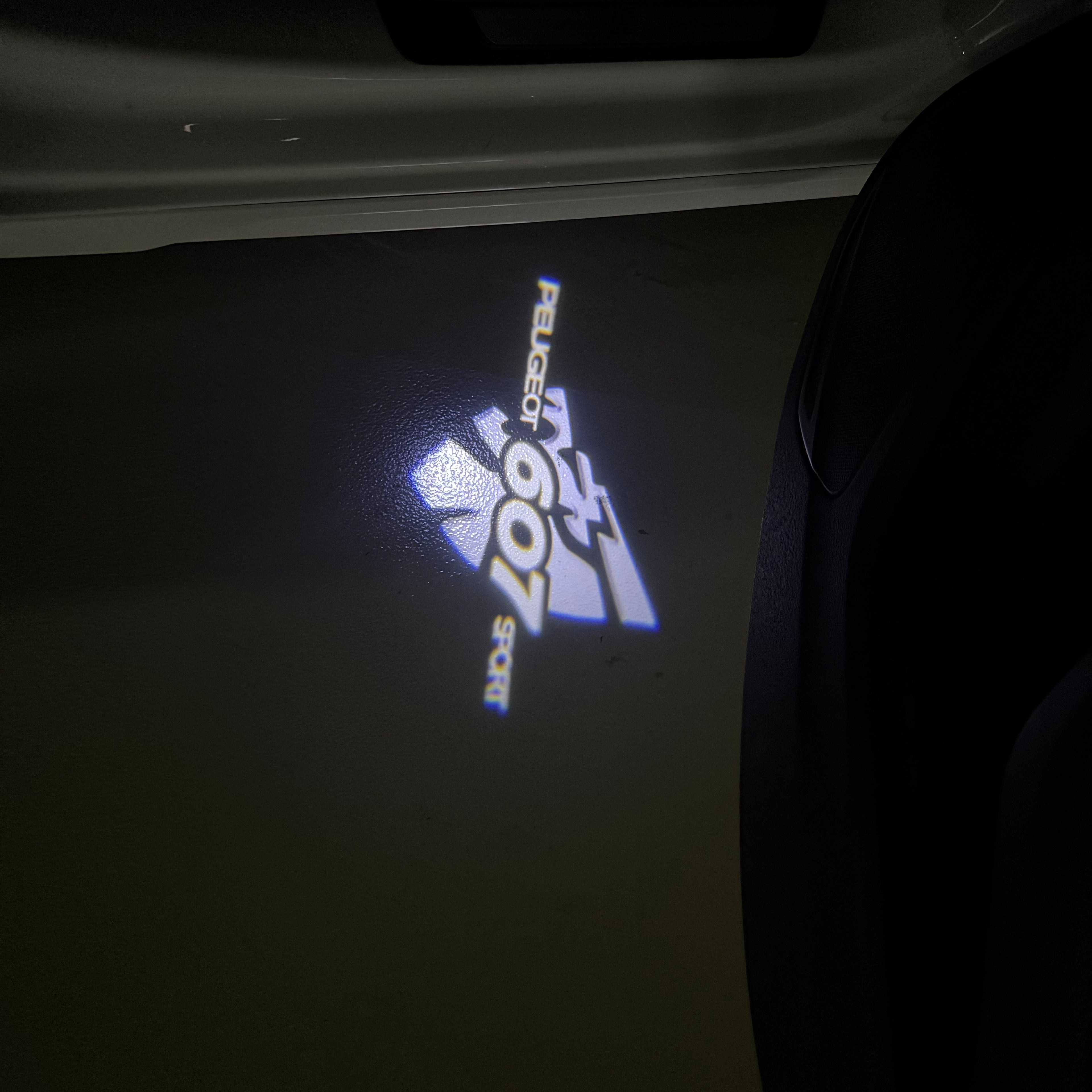 PEUGEOT  607 SPORT  LOGO PROJECTOT LIGHTS (quantity 1 = 1 sets/2 door lights) Nr.6024q53