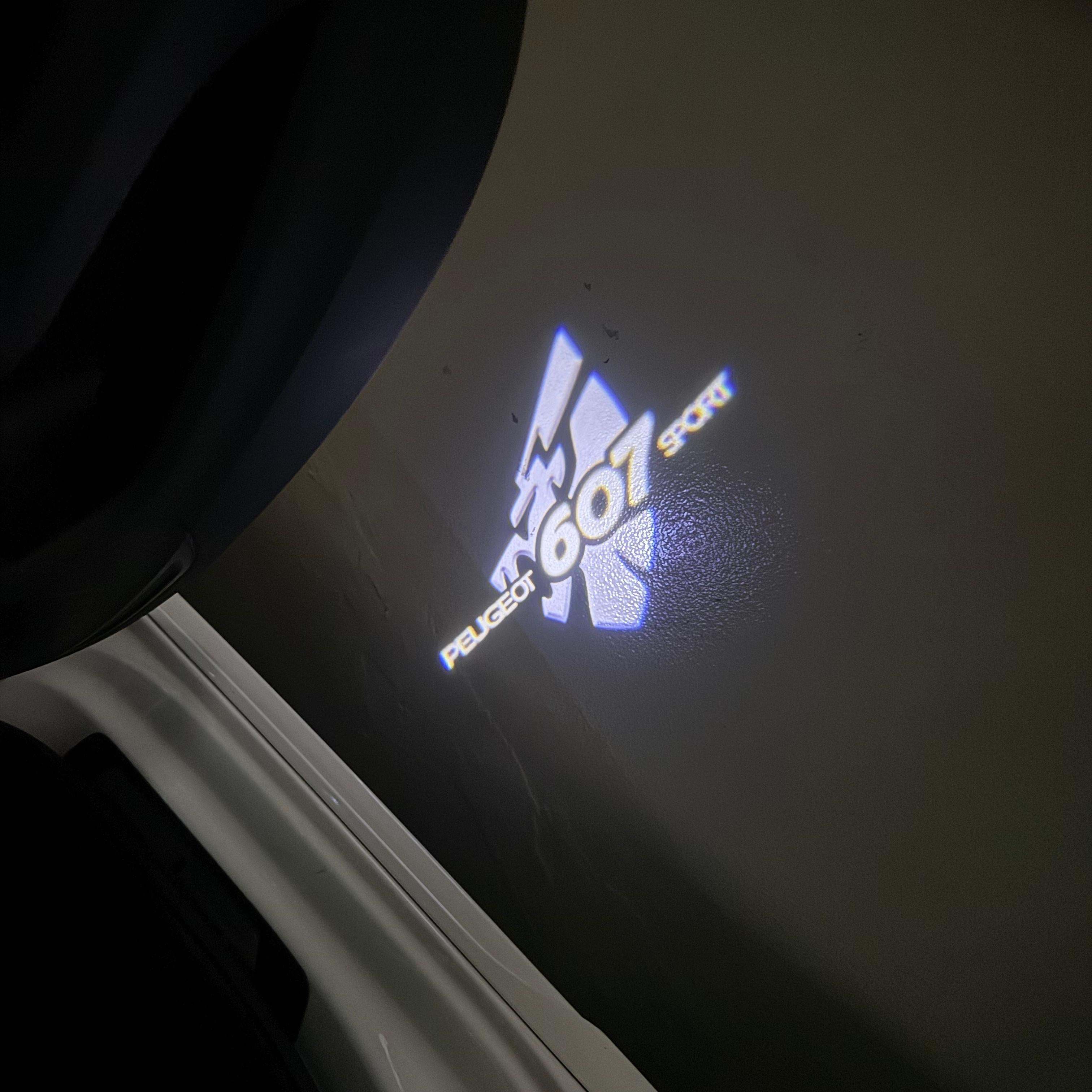 PEUGEOT  607 SPORT  LOGO PROJECTOT LIGHTS (quantity 1 = 1 sets/2 door lights) Nr.6024q53