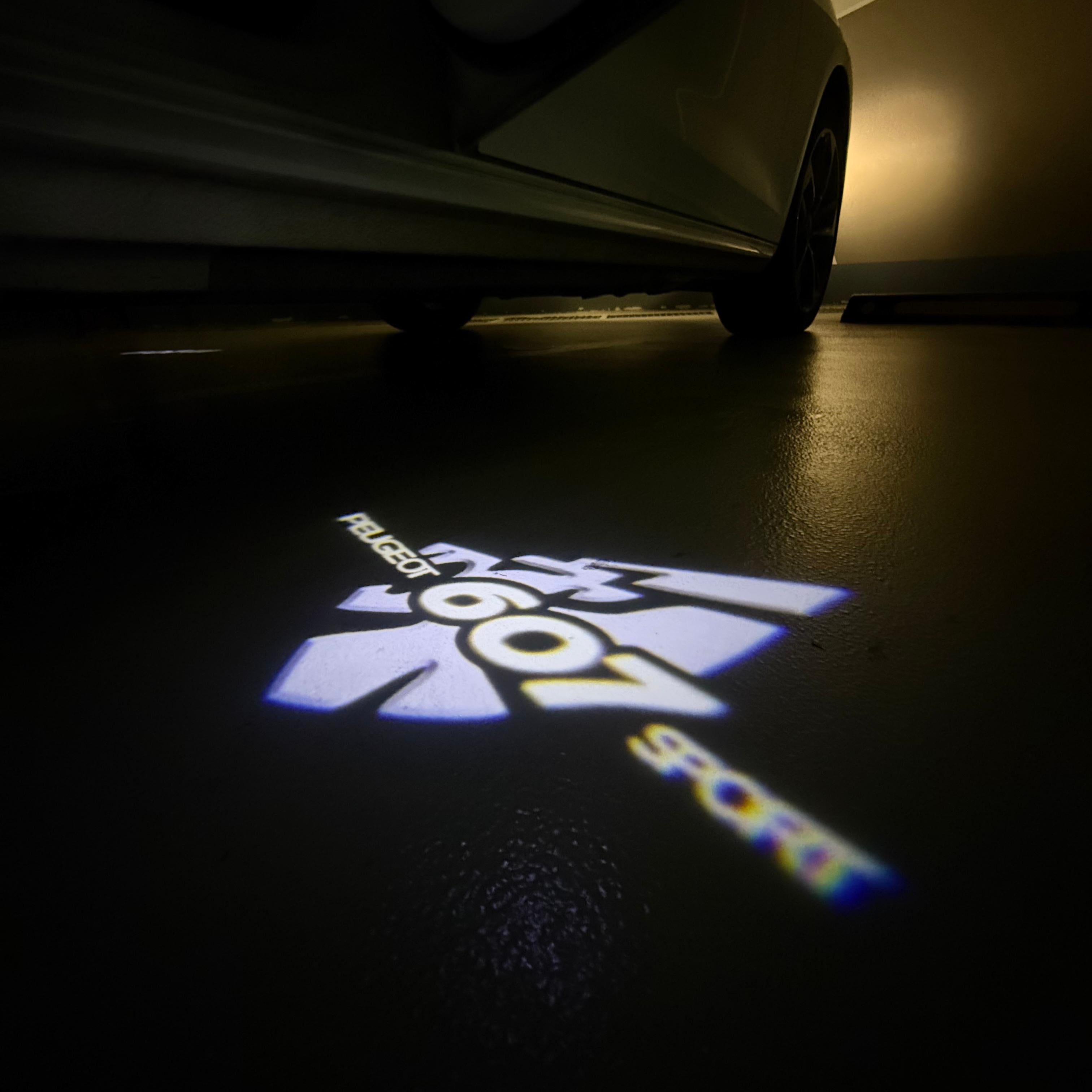 PEUGEOT  607 SPORT  LOGO PROJECTOT LIGHTS (quantity 1 = 1 sets/2 door lights) Nr.6024q53