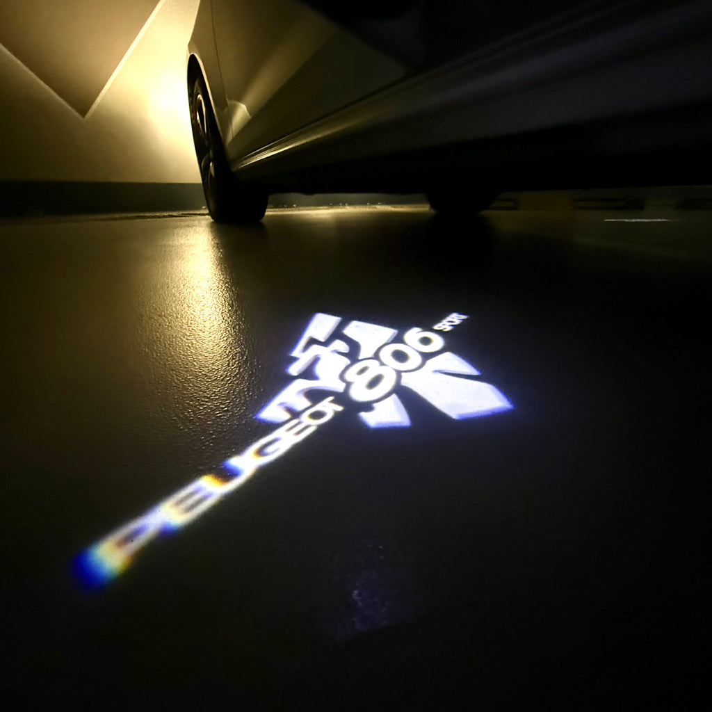 PEUGEOT  806 SPORT  LOGO PROJECTOT LIGHTS (quantity 1 = 1 sets/2 door lights) Nr.6024q58