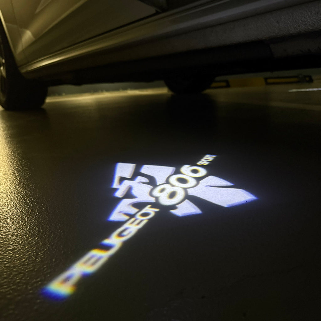 PEUGEOT  806 SPORT  LOGO PROJECTOT LIGHTS (quantity 1 = 1 sets/2 door lights) Nr.6024q58