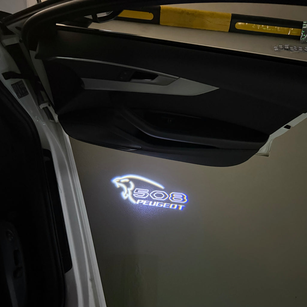 PEUGEOT 508  LOGO PROJECTOT LIGHTS (quantity 1 = 1 sets/2 door lights) Nr.6024q47