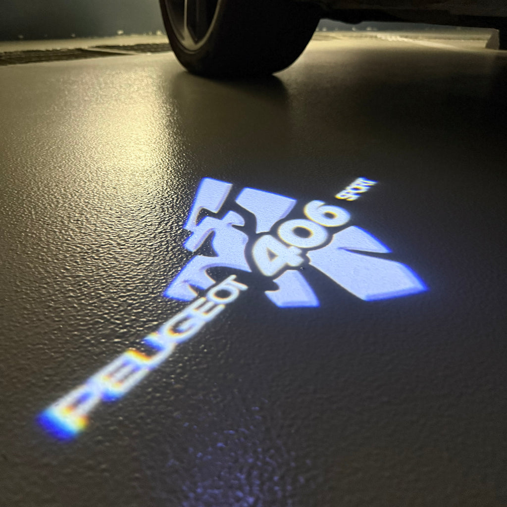 PEUGEOT  406 SPORT  LOGO PROJECTOT LIGHTS (quantity 1 = 1 sets/2 door lights) Nr.6024q30