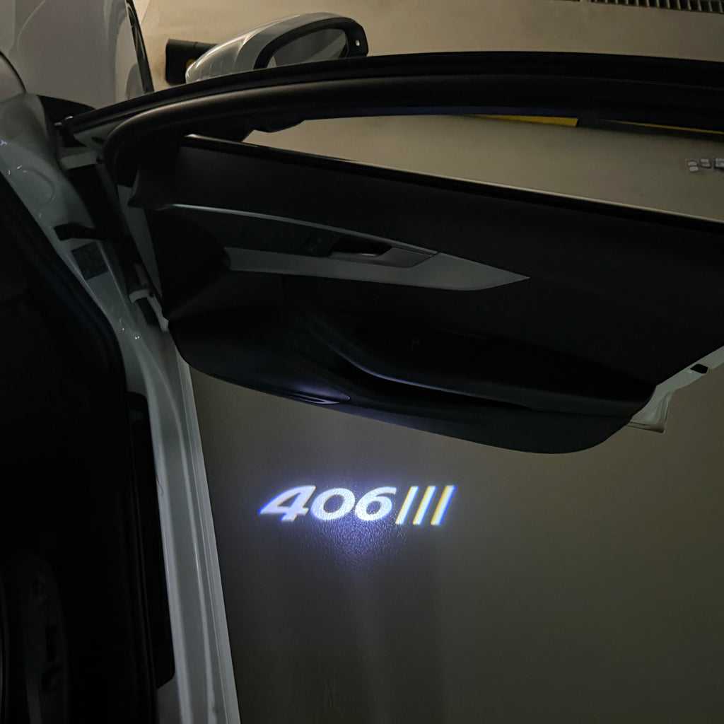 PEUGEOT 406  LOGO PROJECTOT LIGHTS (quantity 1 = 1 sets/2 door lights) Nr.6024q26