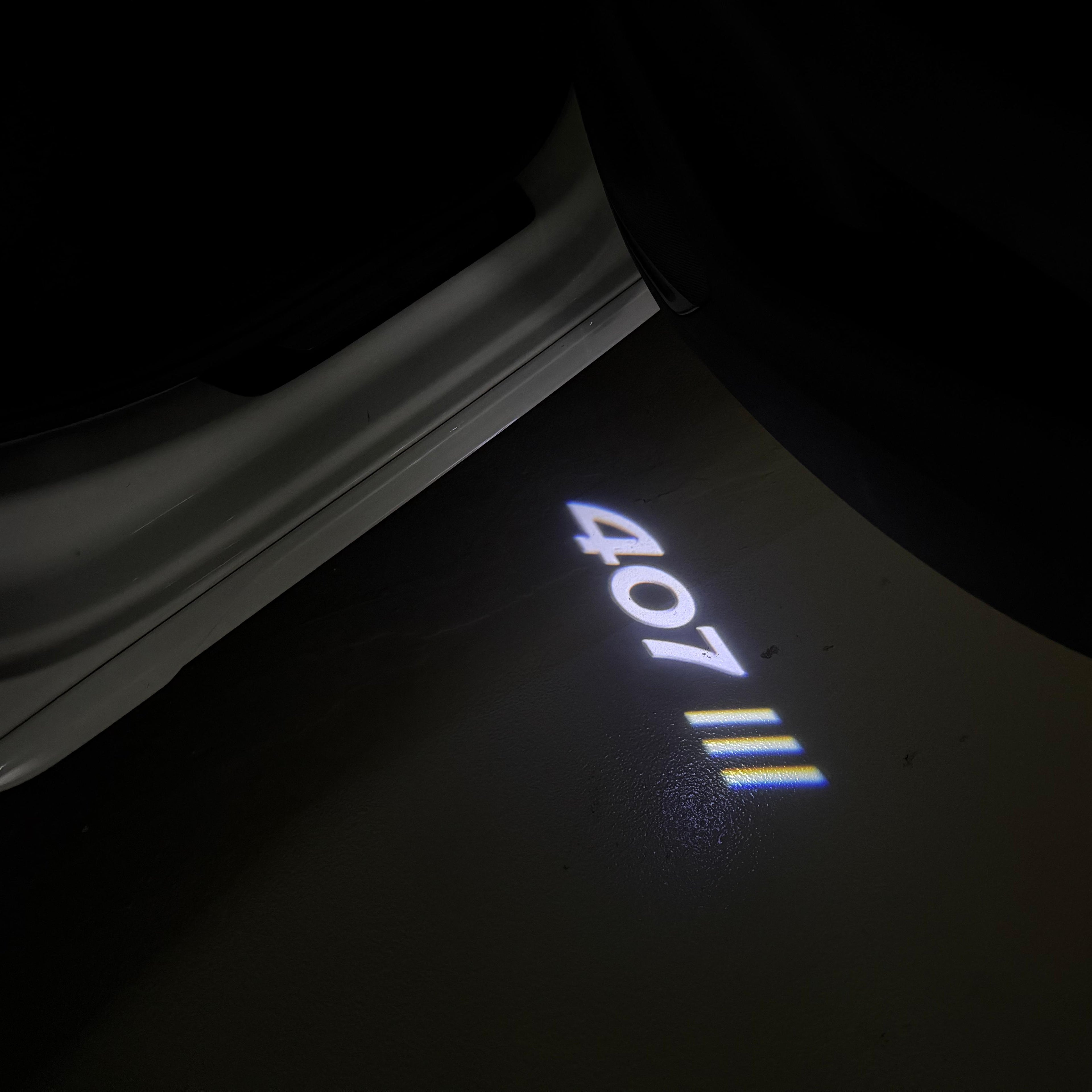 PEUGEOT 407  LOGO PROJECTOT LIGHTS (quantity 1 = 1 sets/2 door lights) Nr.6024q31