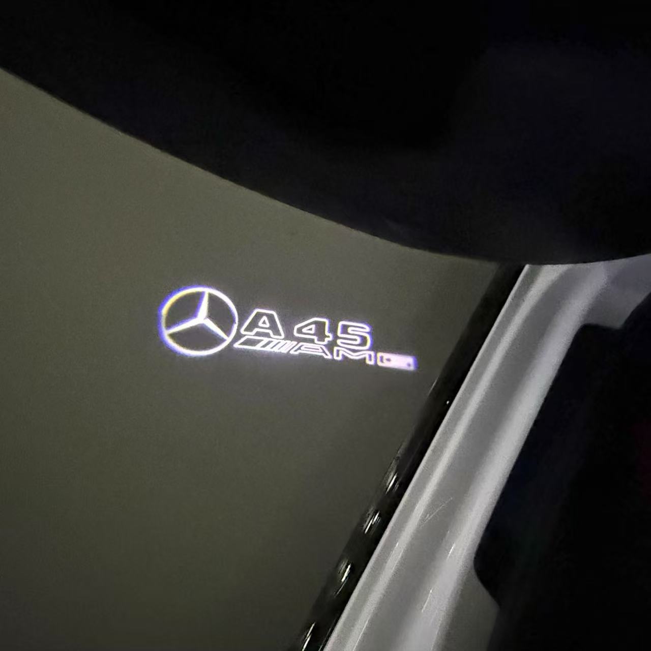 MERCEDES BENZ A45 AMG LOGO PROJECTOR LIGHTS  (quantity 1 = 1 sets/2 door lights)Nr.03f019