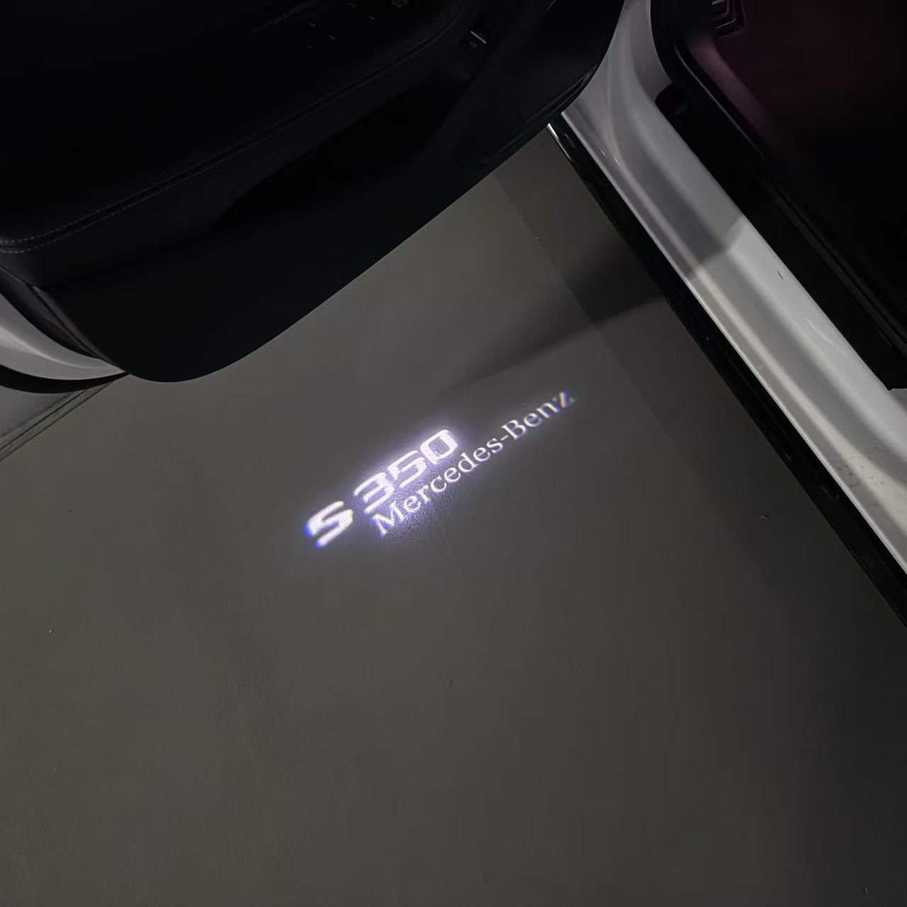 MERCEDES BENZ S 350 LOGO PROJECTOR LIGHTS  (quantity 1 = 1 sets/2 door lights)Nr.03f029