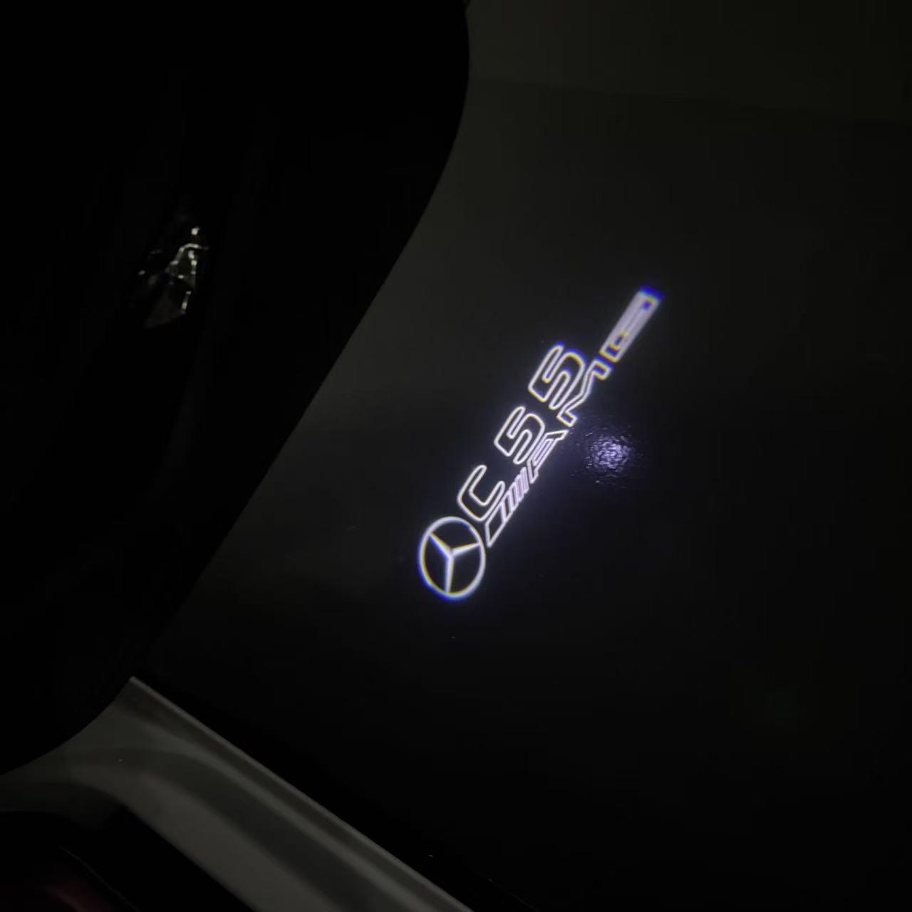 MERCEDES BENZ  C55 AMG LOGO PROJECTOT LIGHTS  (quantity 1 = 1 sets/2 door lights)Nr.03f09