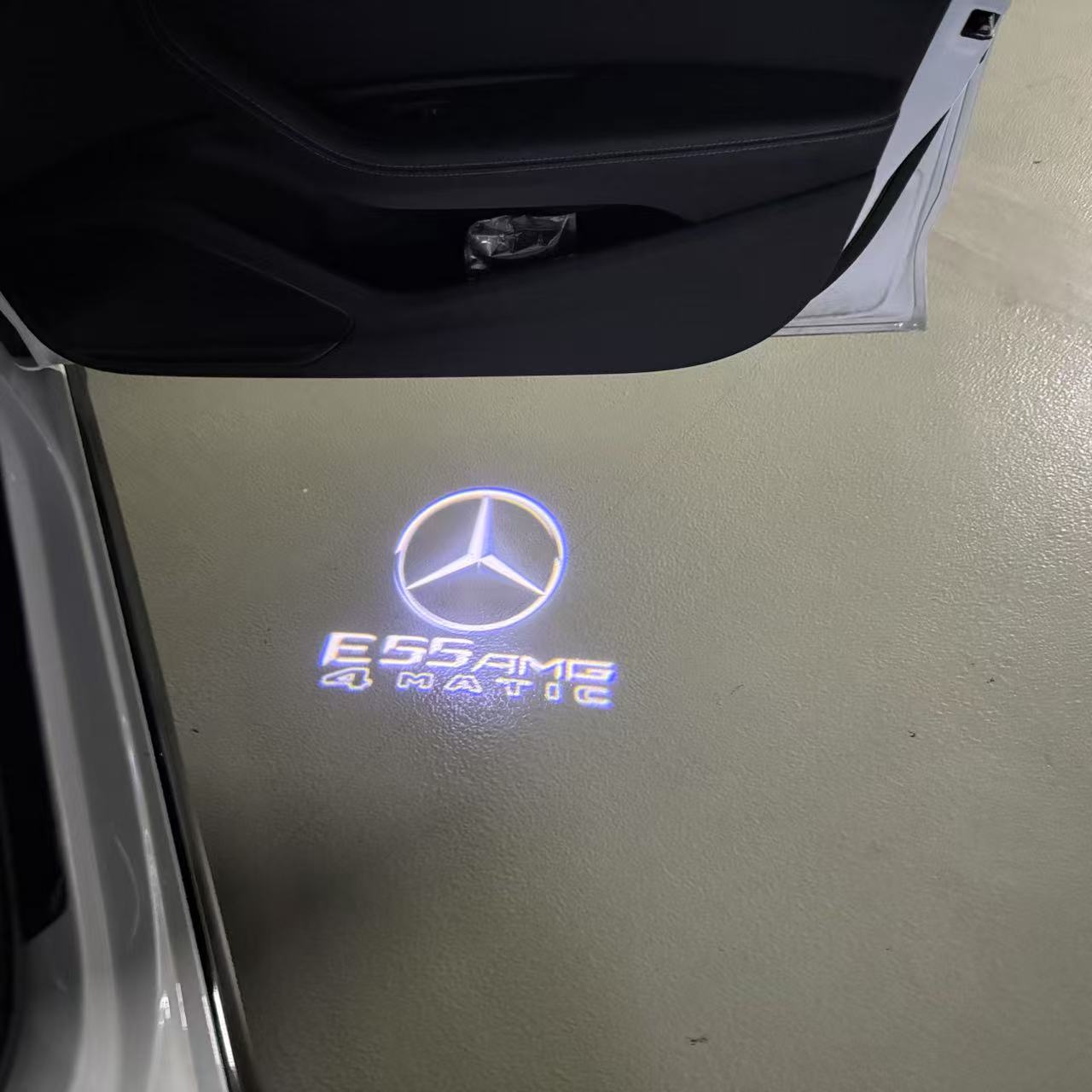 MERCEDES BENZ E55 AMG LOGO PROJECTOT LIGHTS  (quantity 1 = 1 sets/2 door lights)Nr.03f03