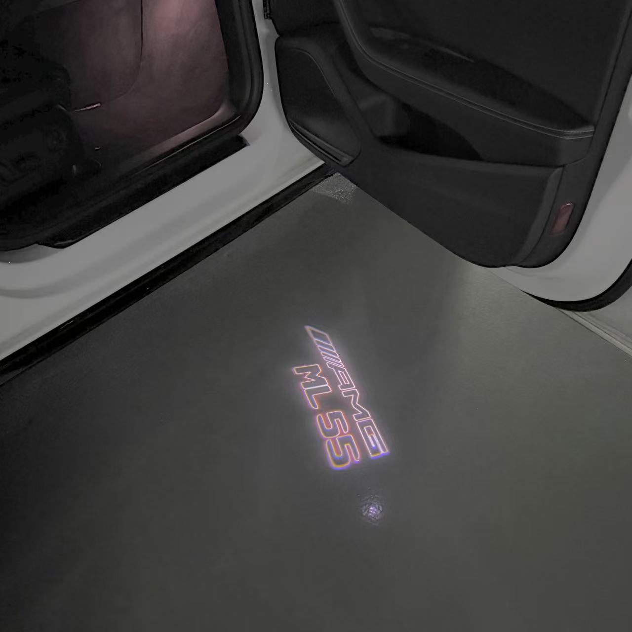 MERCEDES BENZ ML 55 AMG LOGO PROJECTOR LIGHTS  (quantity 1 = 1 sets/2 door lights)Nr.03f04