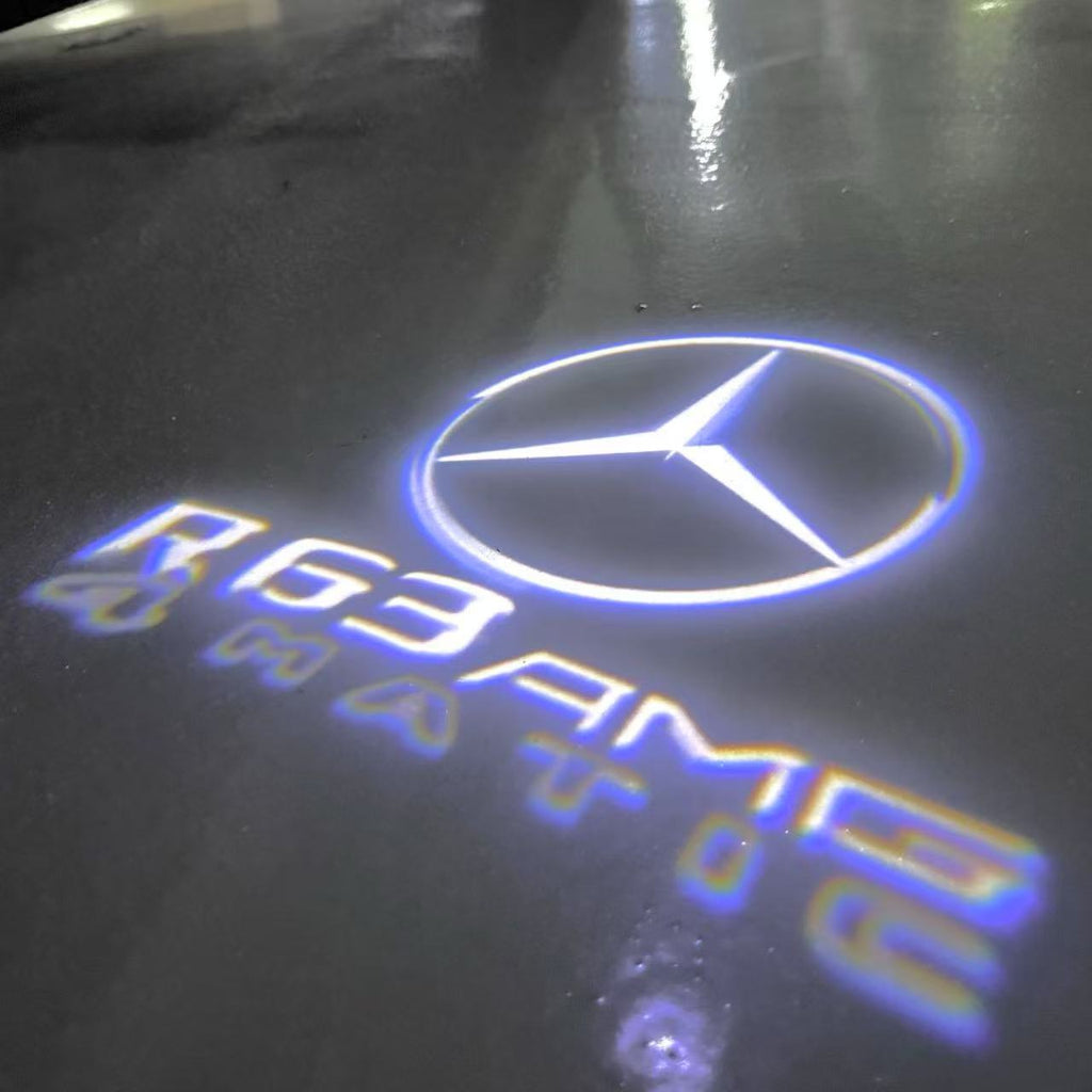 MERCEDES BENZ R 63 AMG LOGO PROJECTOR LIGHTS  (quantity 1 = 1 sets/2 door lights)Nr.03f044