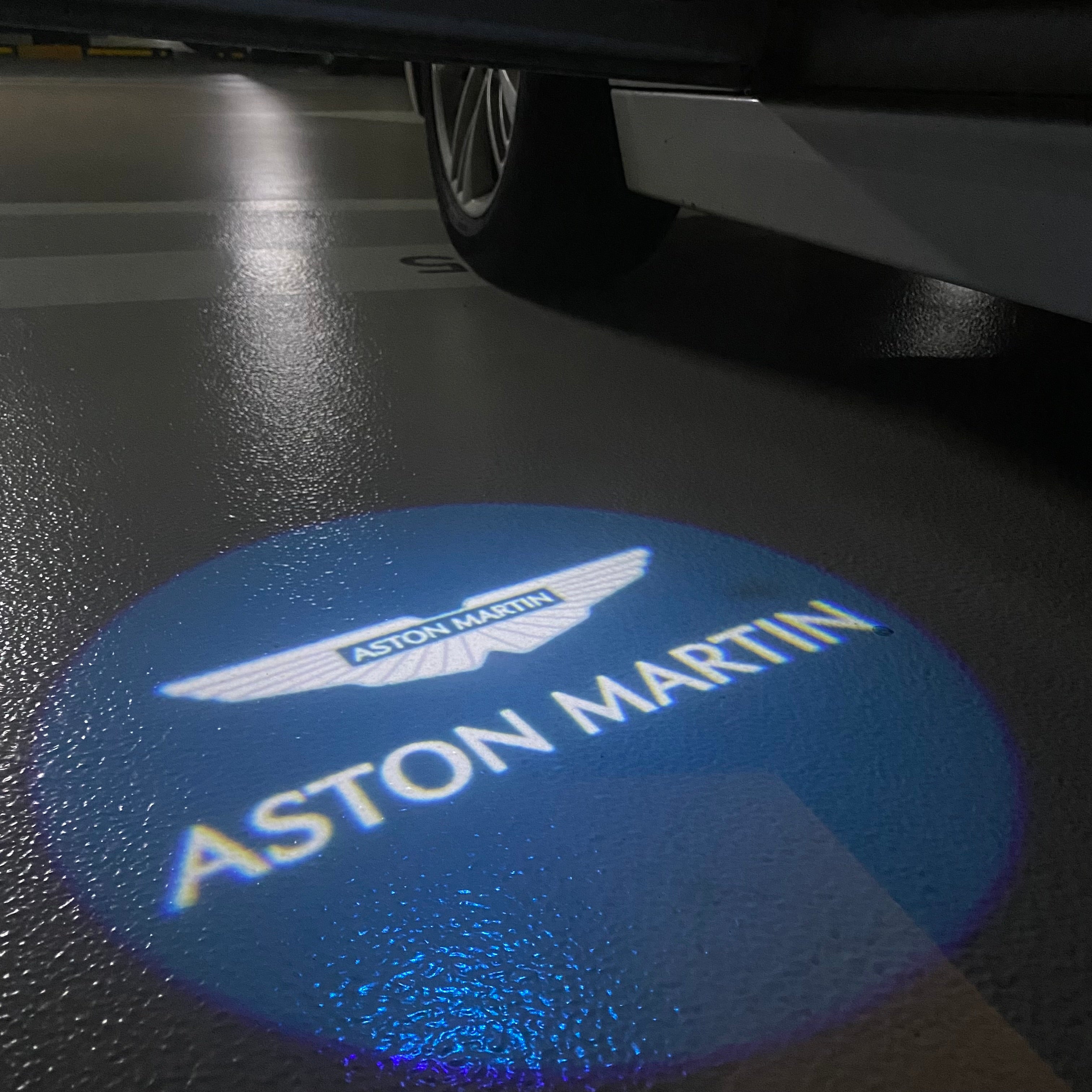 Aston Martin  ORIGINAL LOGO PROJECROTR LIGHTS Nr.0AA1 (quantity 1 = 1 sets/2 door lights)
