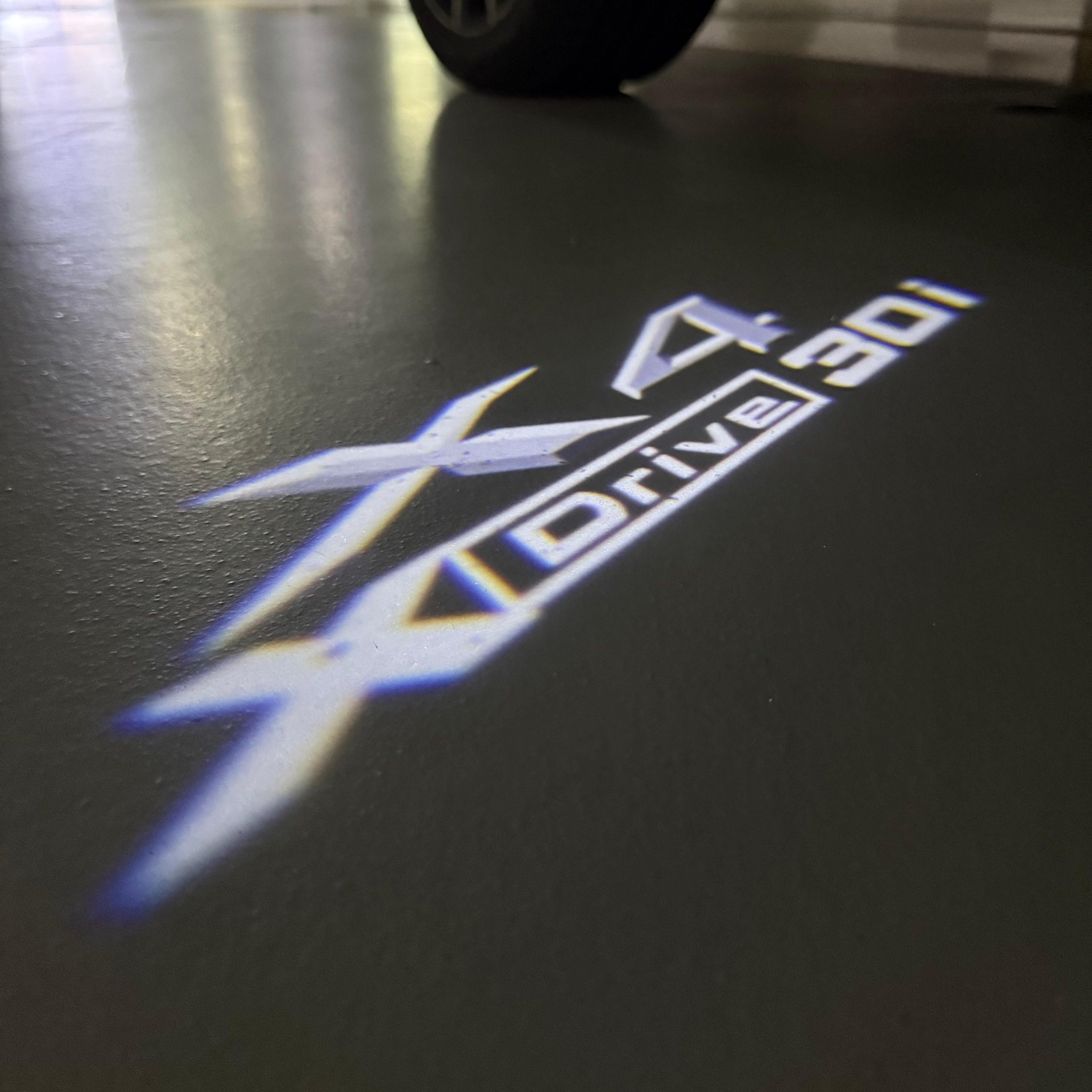 BMW X4 Drive 30i  LOGO PROJECTOT LIGHTS (quantity 1 = 1 sets/2 door lights) Nr.6024q0t038