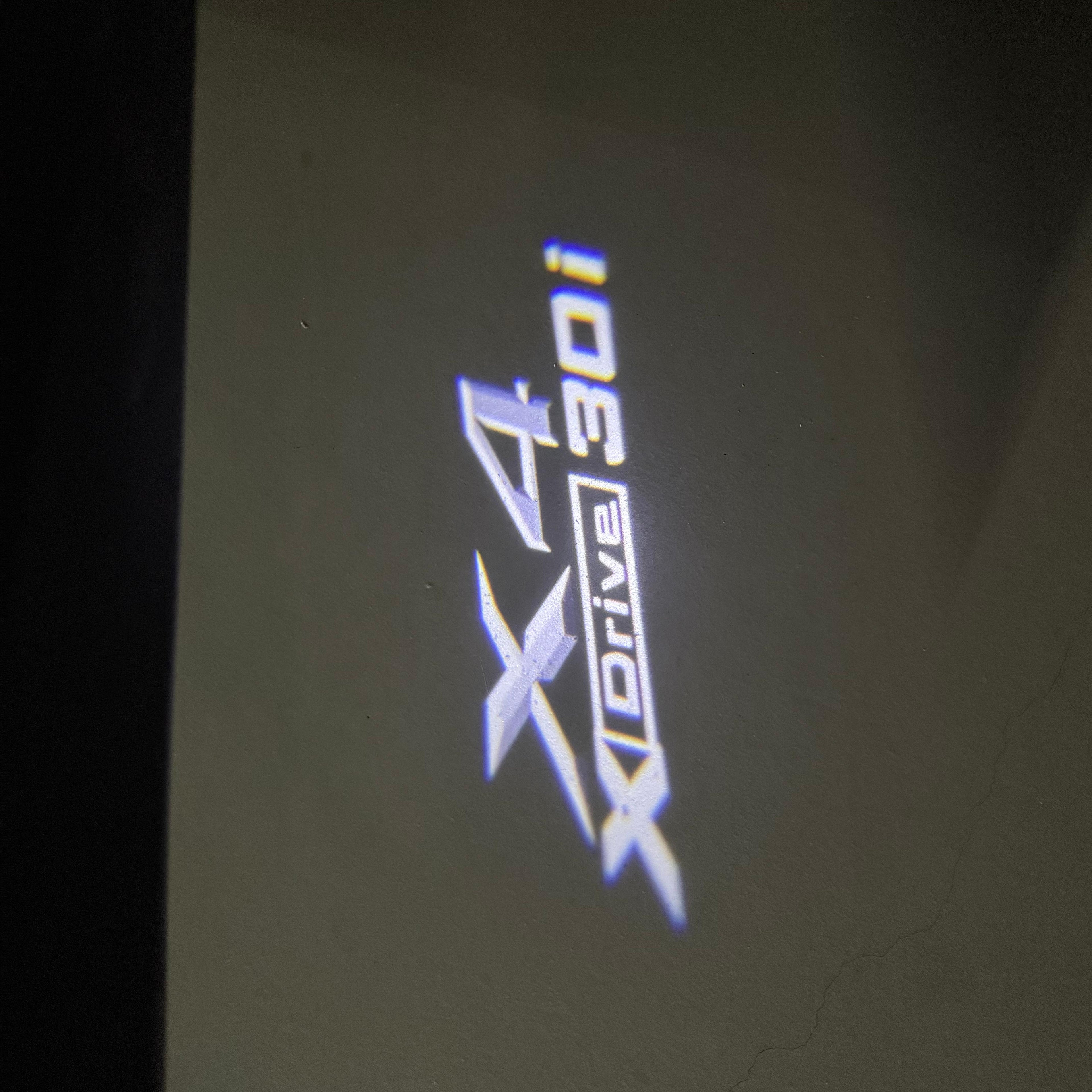 BMW X4 Drive 30i  LOGO PROJECTOT LIGHTS (quantity 1 = 1 sets/2 door lights) Nr.6024q0t038