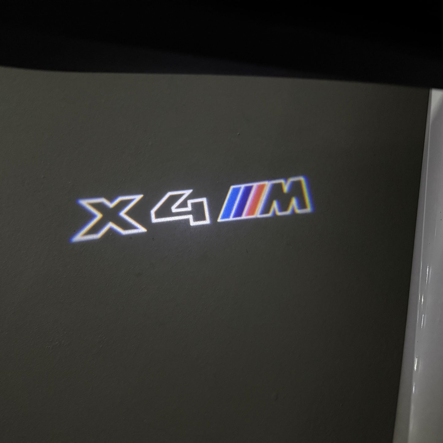 BMW  X4M LOGO PROJECTOT LIGHTS (quantity 1 = 1 sets/2 door lights) Nr.6024q0t041