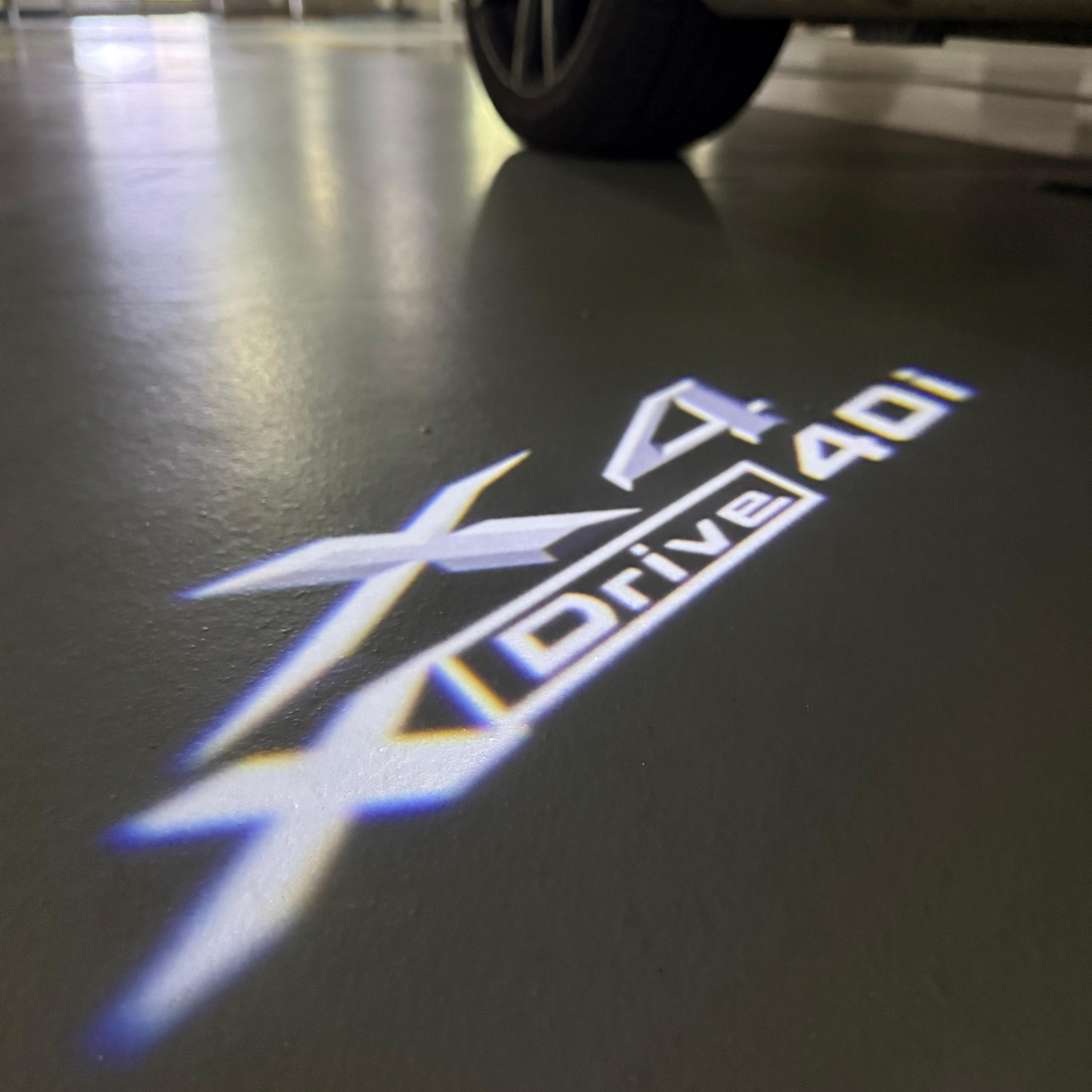 BMW X4 Drive 40i  LOGO PROJECTOT LIGHTS (quantity 1 = 1 sets/2 door lights) Nr.6024q0t039