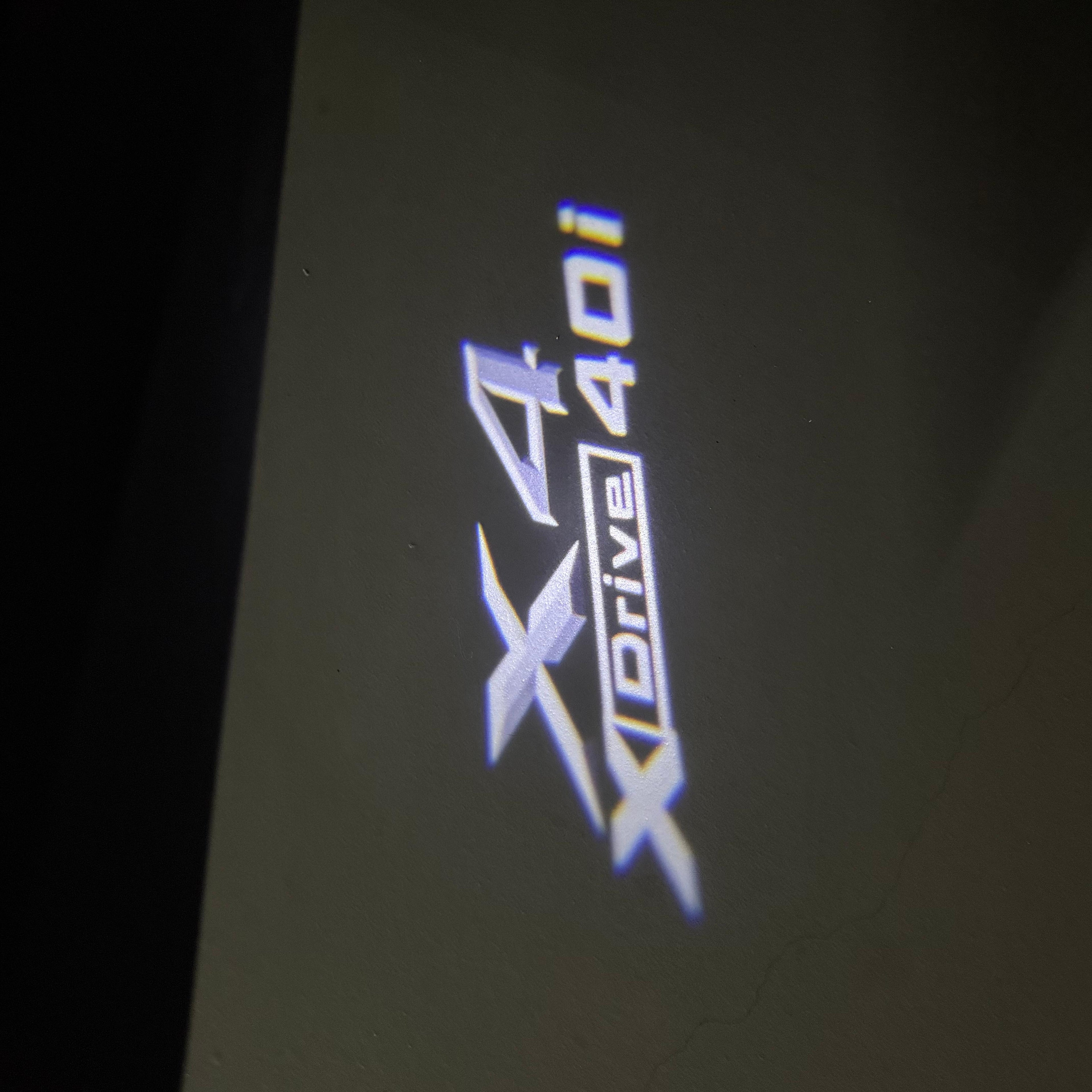 BMW X4 Drive 40i  LOGO PROJECTOT LIGHTS (quantity 1 = 1 sets/2 door lights) Nr.6024q0t039