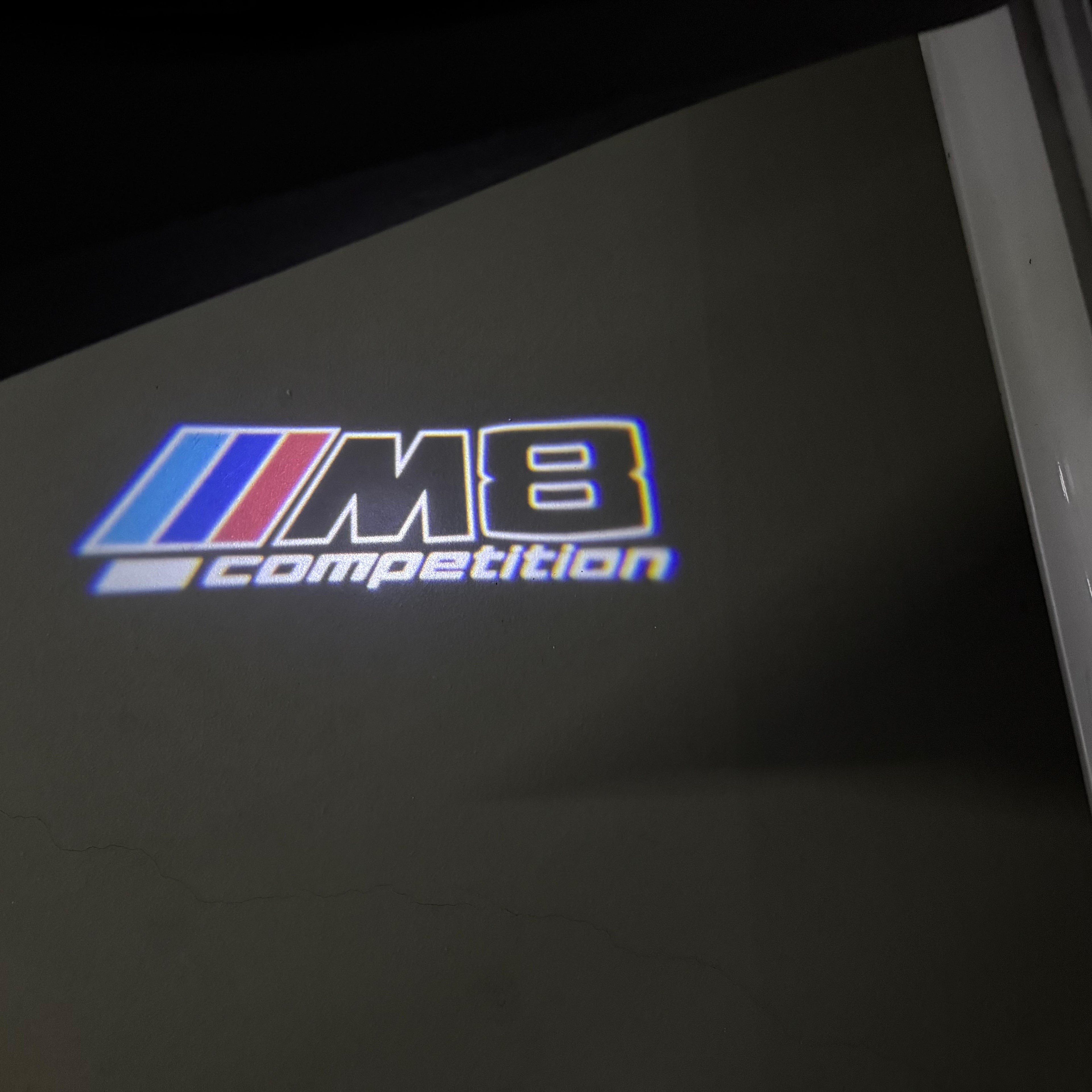 BMW 8 SERIES M8  LOGO PROJECTOT LIGHTS (quantity 1 = 1 sets/2 door lights) Nr.6024S05
