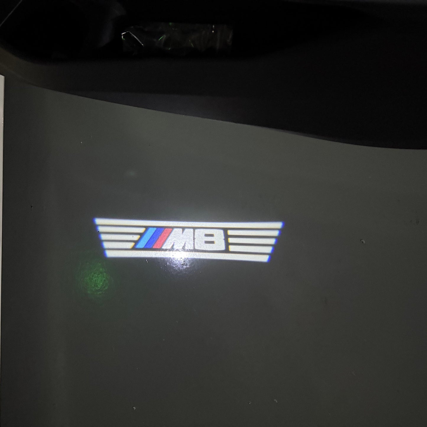 BMW  8 SERIES M8  LOGO PROJECTOT LIGHTS (quantity 1 = 1 sets/2 door lights) Nr.6024q108