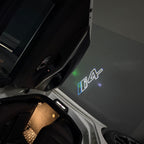 ÉCLAIRAGE DE PROJECTEUR BMW M3 LOGO Nr.24 (quantité 1 = 1 jeux / 2 feux de porte)
