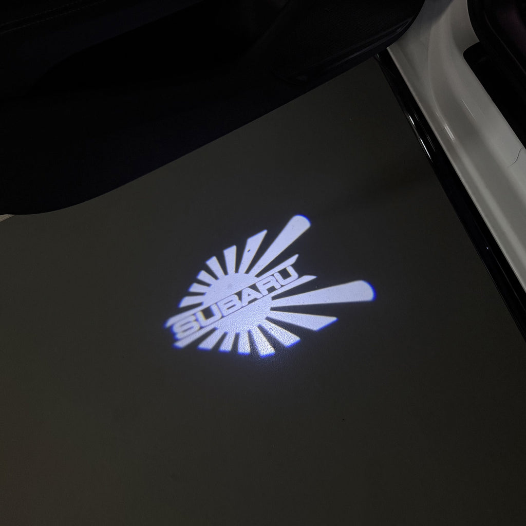 SUBARU ORIGINAL LOGO PROJECROTR LIGHTS (quantity 1 = 1 sets/2 door lights) Nr.10