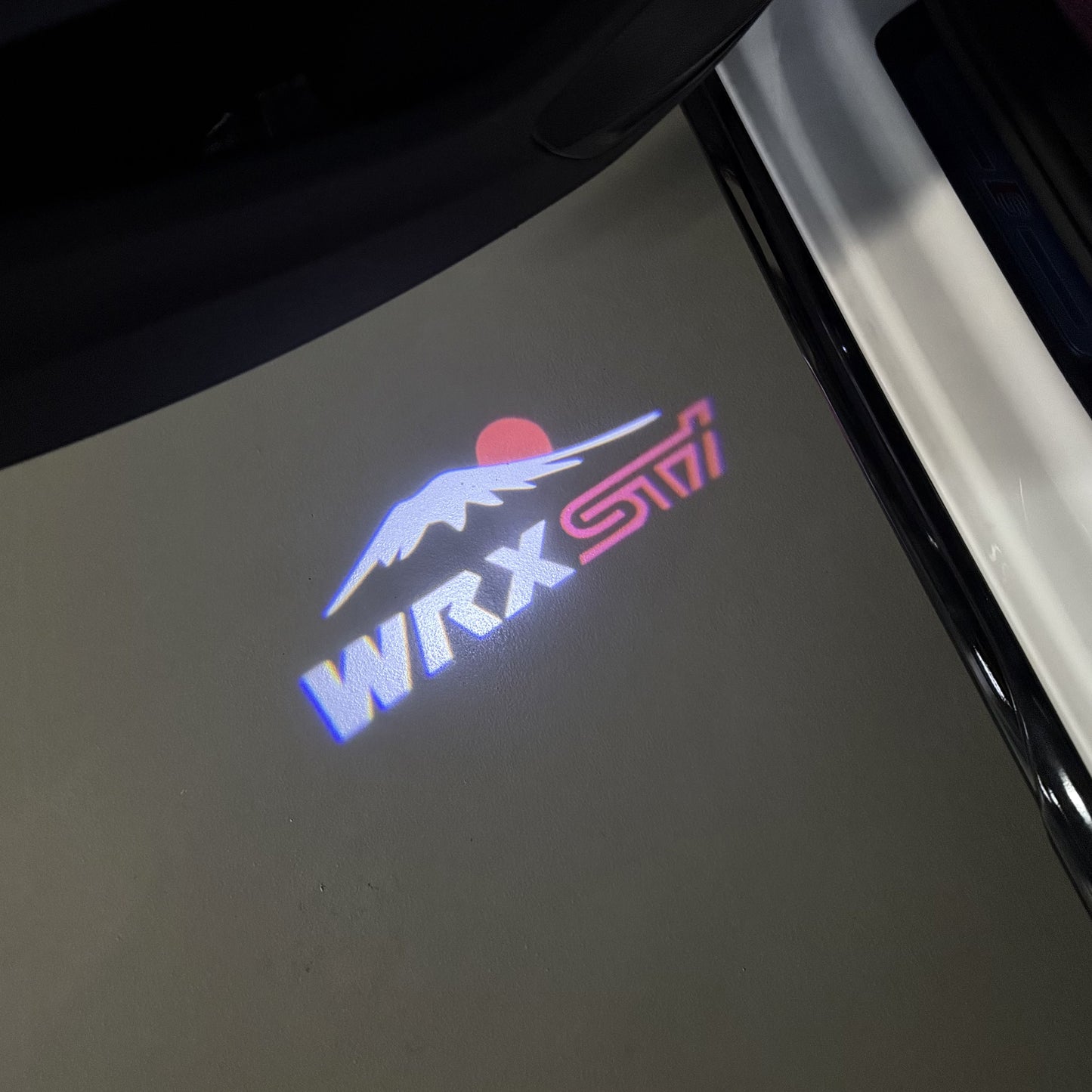 SUBARU WRX STI LOGO PROJECROTR LIGHTS (quantity 1 = 1 sets/2 door lights) Nr.03A20