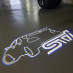 SUBARU IMPREZA STI LOGO PROJECROTR LIGHTS (quantity 1 = 1 sets/2 door lights) Nr.03A25