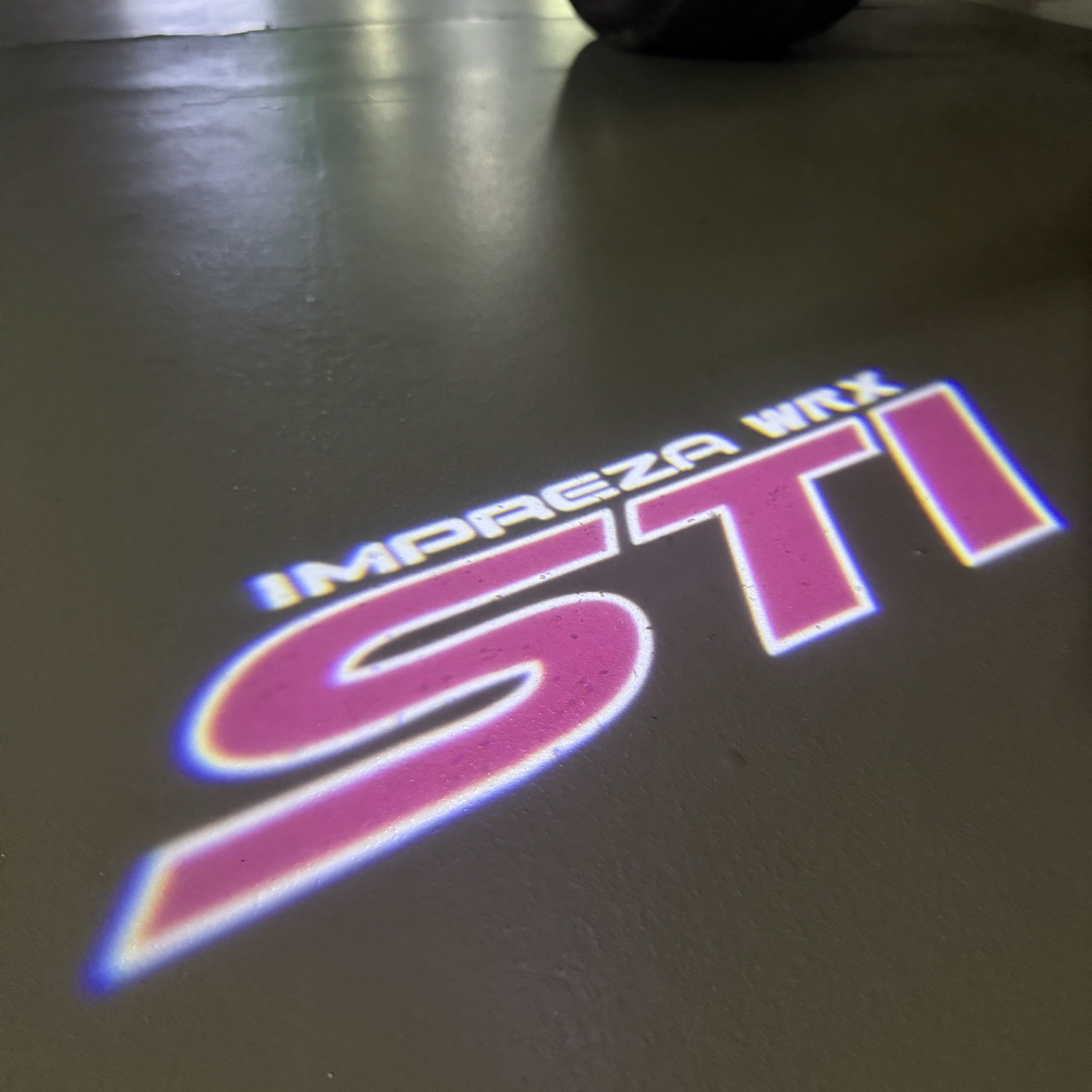 SUBARU IMPREZA STI LOGO PROJECROTR LIGHTS (quantity 1 = 1 sets/2 door lights) Nr.03A23