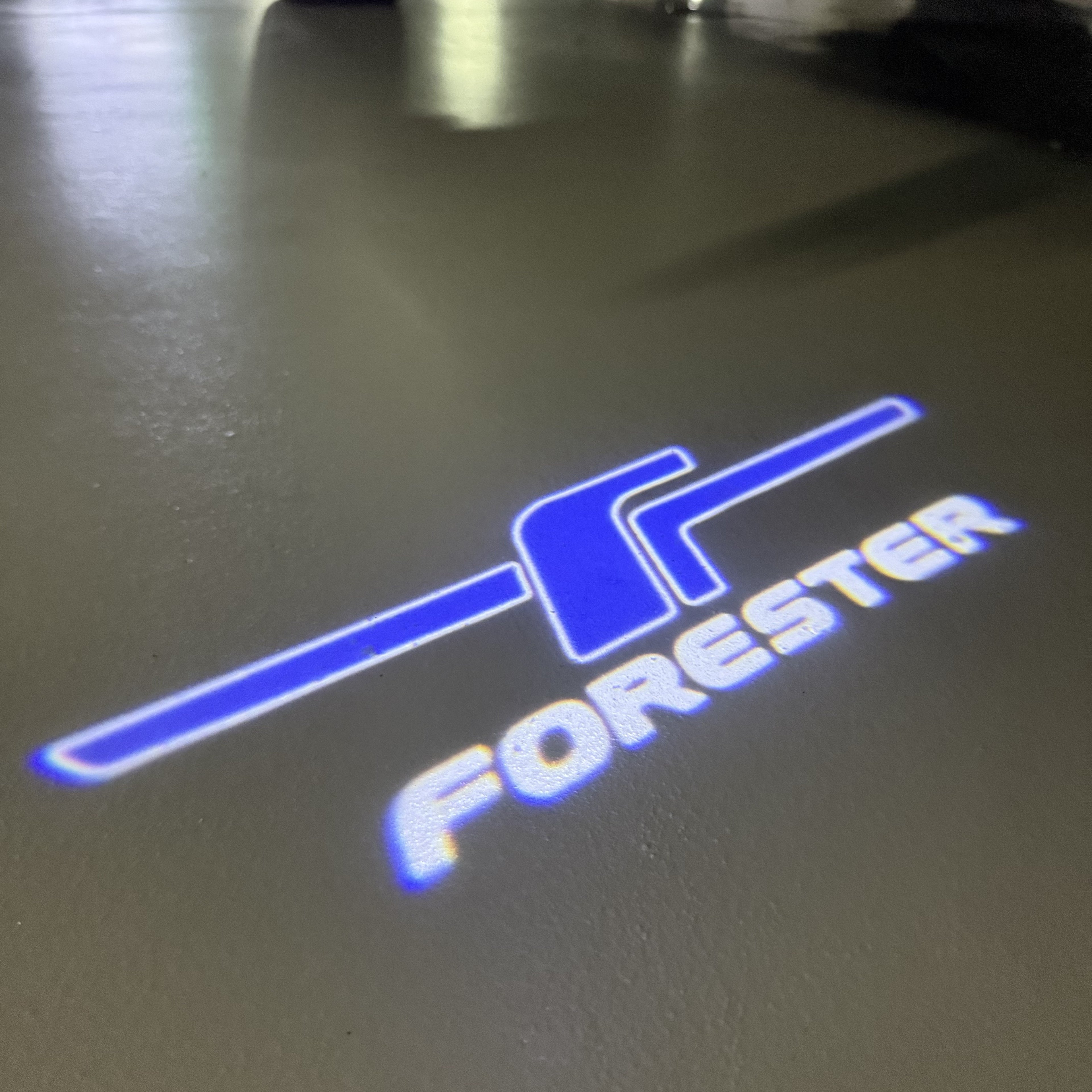 SUBARU FORESTER LOGO PROJECROTR LIGHTS (quantity 1 = 1 sets/2 door lights) Nr.03A34