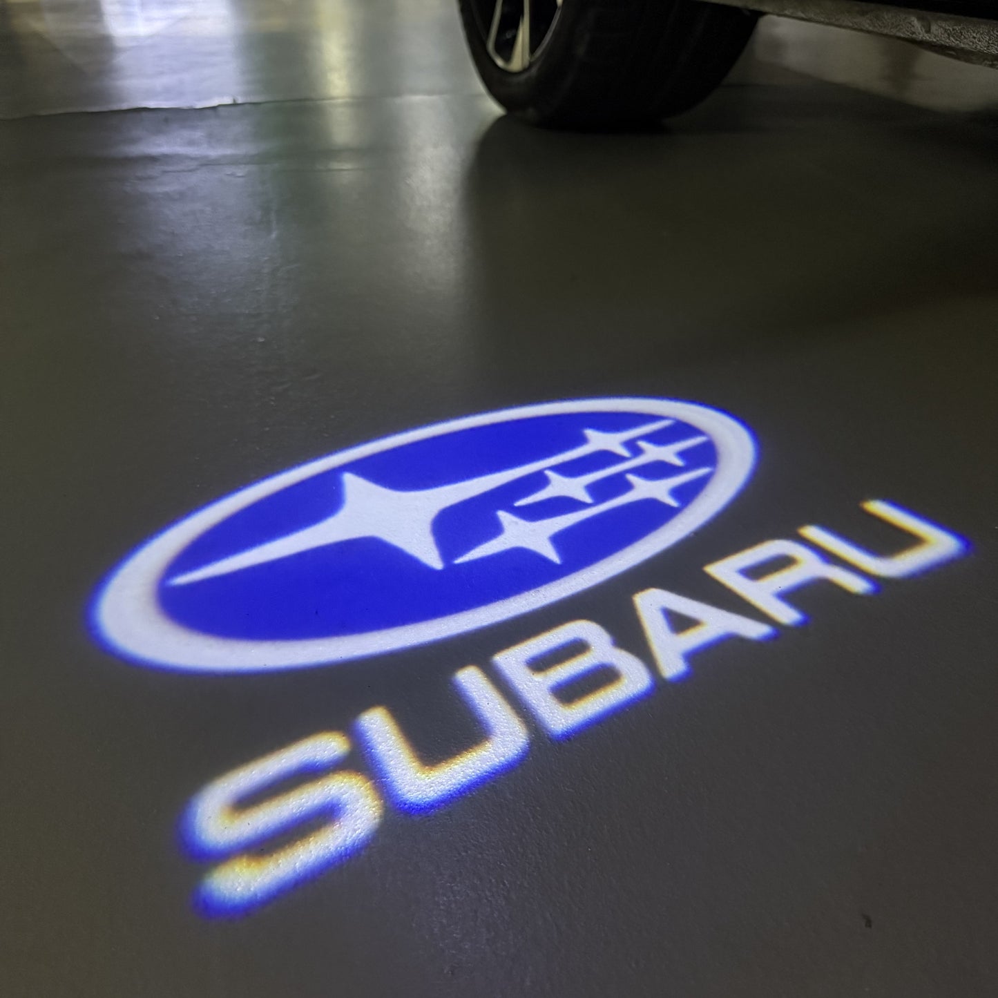 SUBARU ORIGINAL LOGO PROJECROTR LIGHTS (quantity 1 = 1 sets/2 door lights) Nr.12