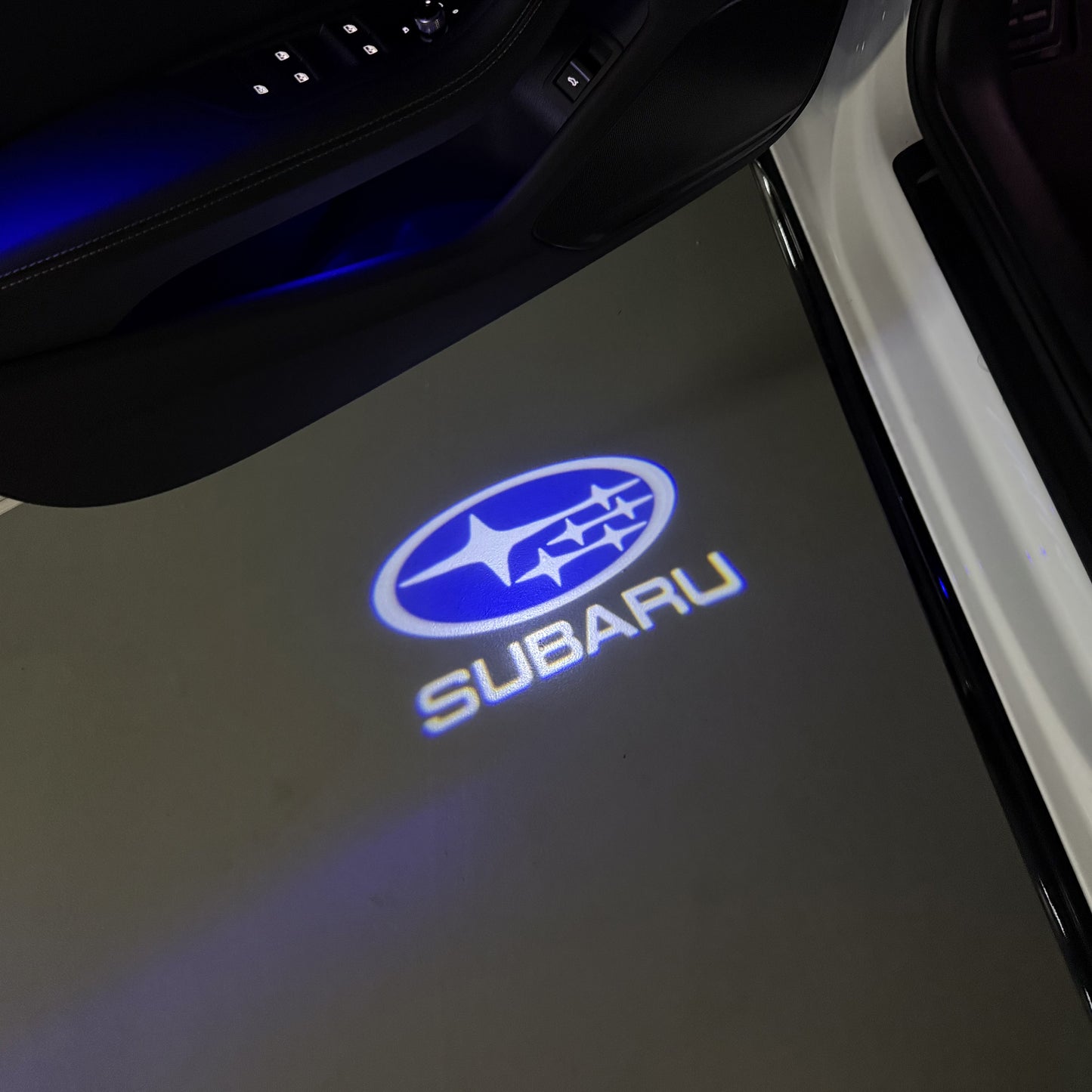 SUBARU ORIGINAL LOGO PROJECROTR LIGHTS (quantity 1 = 1 sets/2 door lights) Nr.12