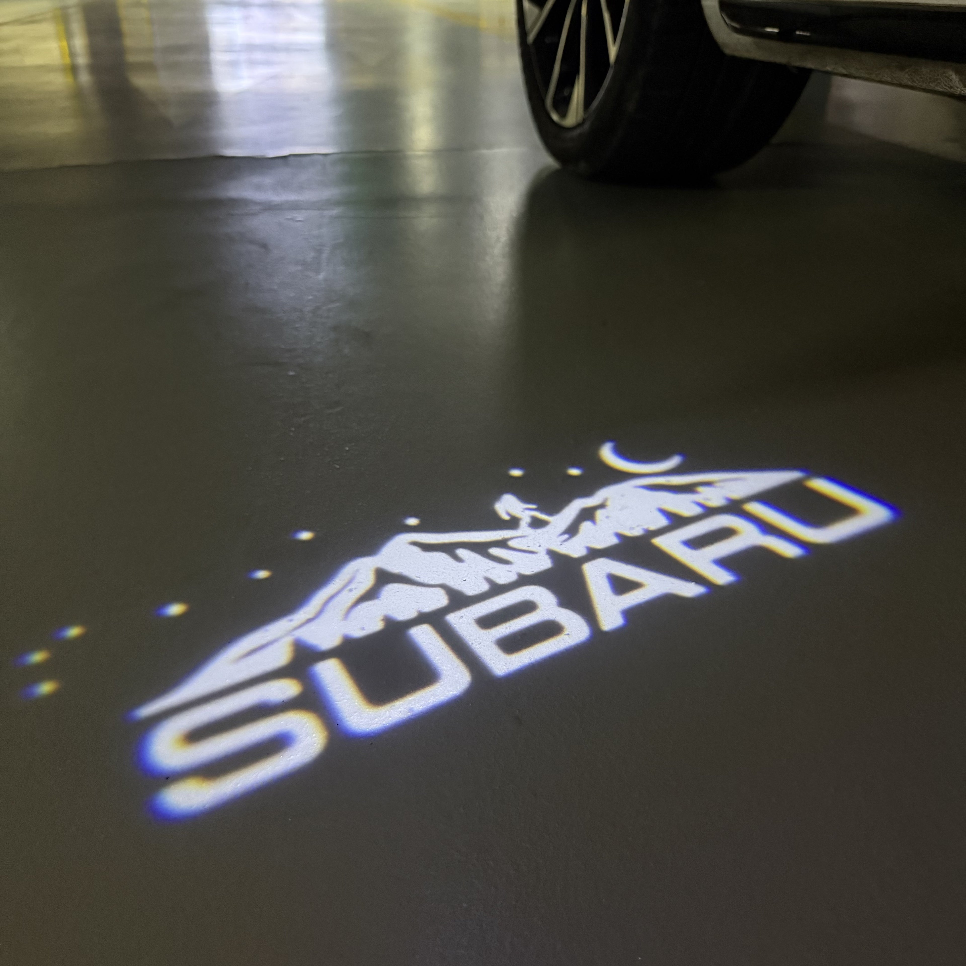SUBARU ORIGINAL LOGO PROJECROTR LIGHTS (quantity 1 = 1 sets/2 door lights) Nr.6
