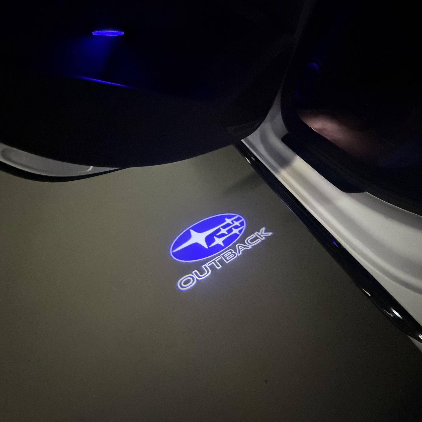 SUBARU OUTBACK LOGO PROJECROTR LIGHTS (quantity 1 = 1 sets/2 door lights) Nr.03A16