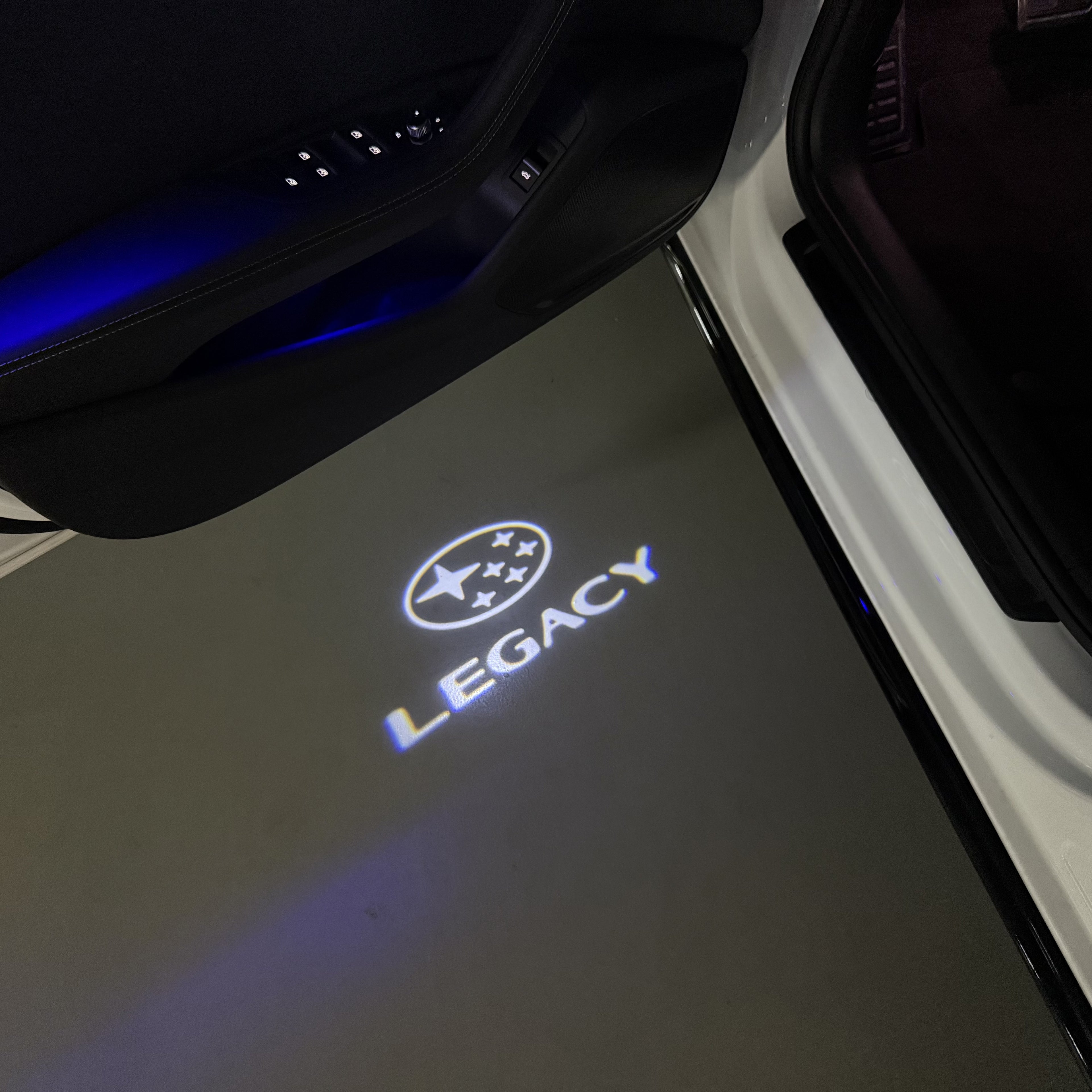 SUBARU LEGACY LOGO PROJECROTR LIGHTS (quantity 1 = 1 sets/2 door lights) Nr.03A37