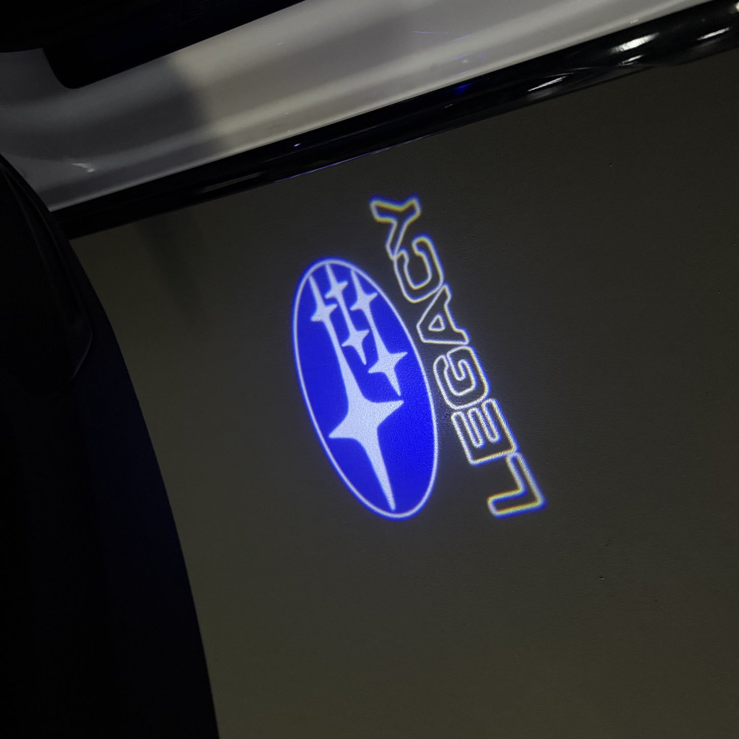 SUBARU LEGACY LOGO PROJECROTR LIGHTS (quantity 1 = 1 sets/2 door lights) Nr.03A38
