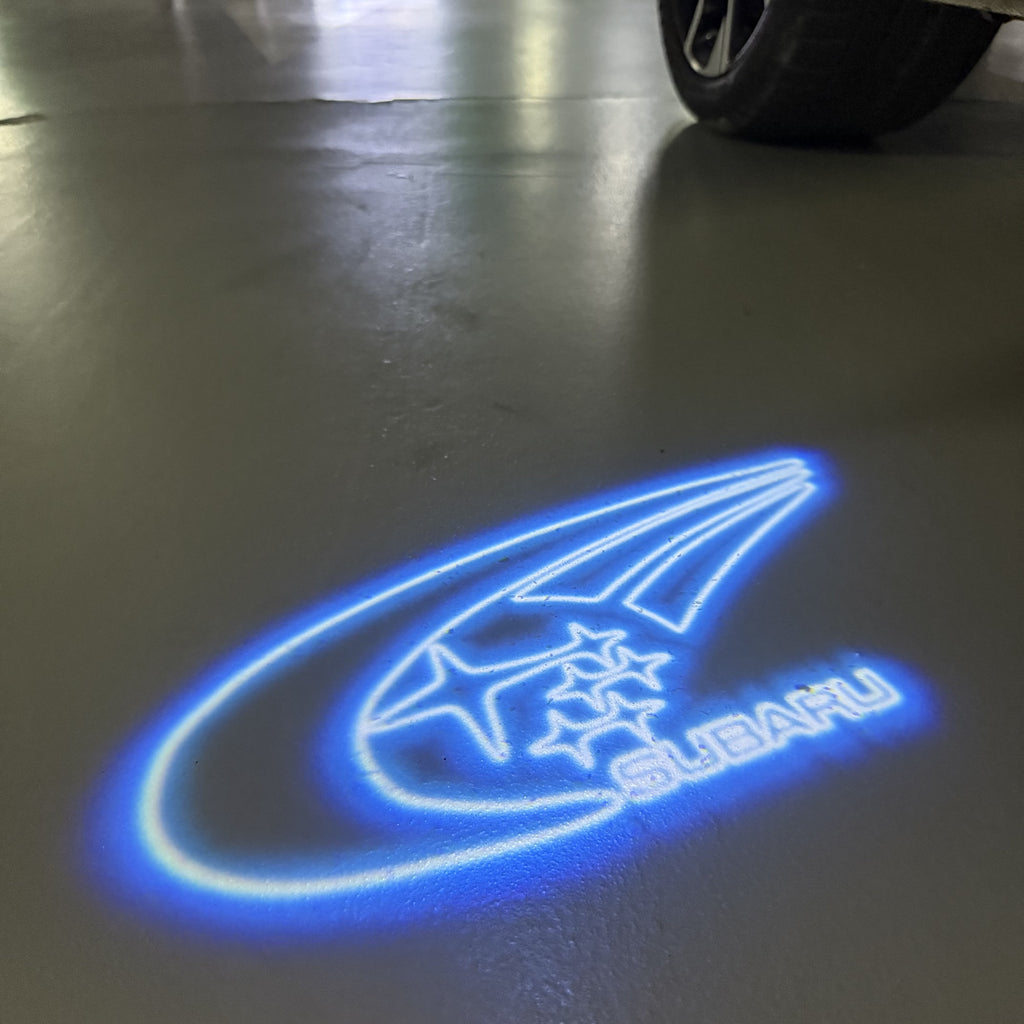SUBARU ORIGINAL LOGO PROJECROTR LIGHTS (quantity 1 = 1 sets/2 door lights) Nr.11
