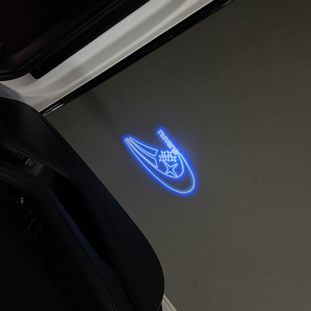 SUBARU ORIGINAL LOGO PROJECROTR LIGHTS (quantity 1 = 1 sets/2 door lights) Nr.11