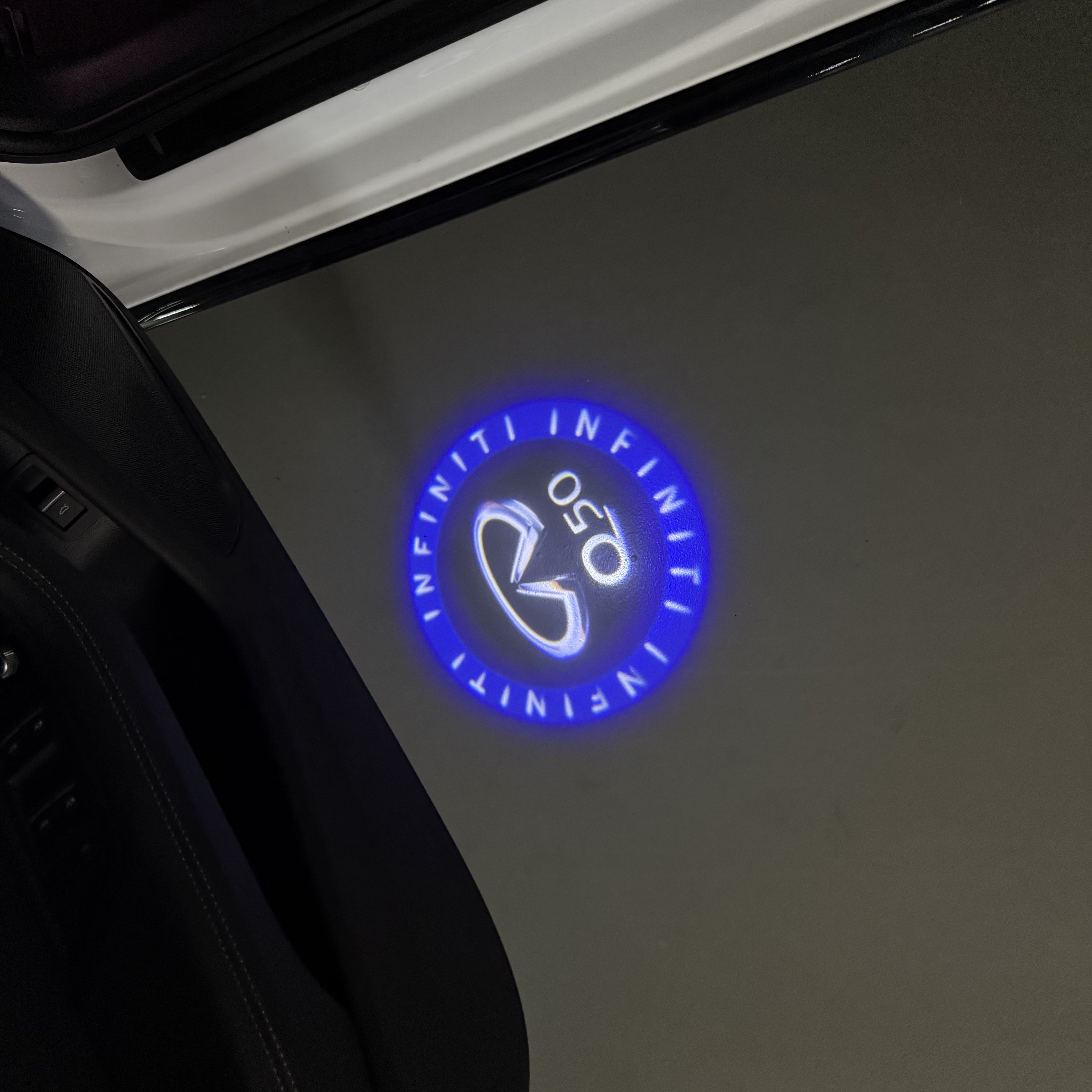 INFINITI  Q50 LOGO PROJECROTR LIGHTS  (quantity 1 = 1 sets/2 door lights)Nr.74A39