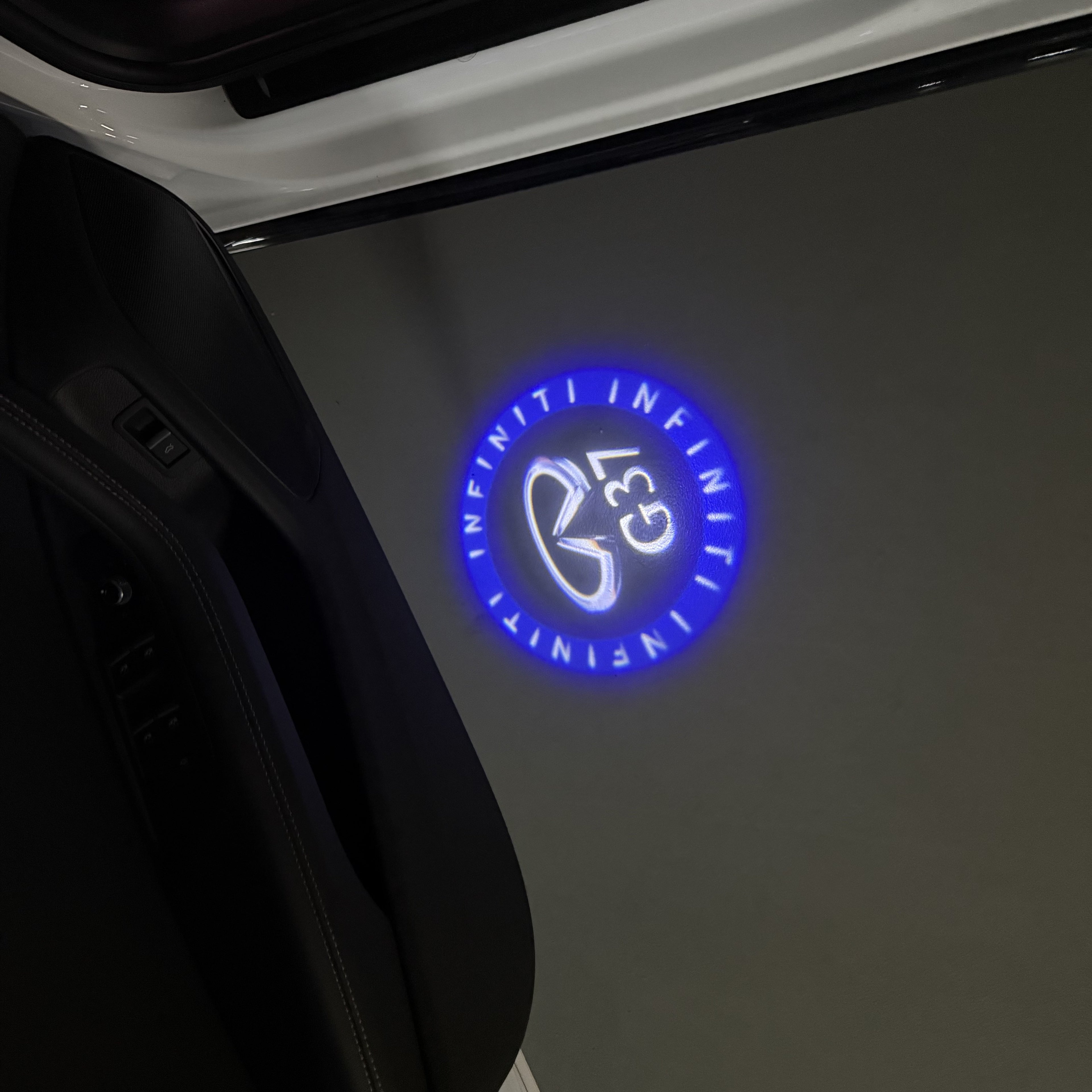 INFINITI  G37 LOGO PROJECROTR LIGHTS  (quantity 1 = 1 sets/2 door lights)Nr.74A65