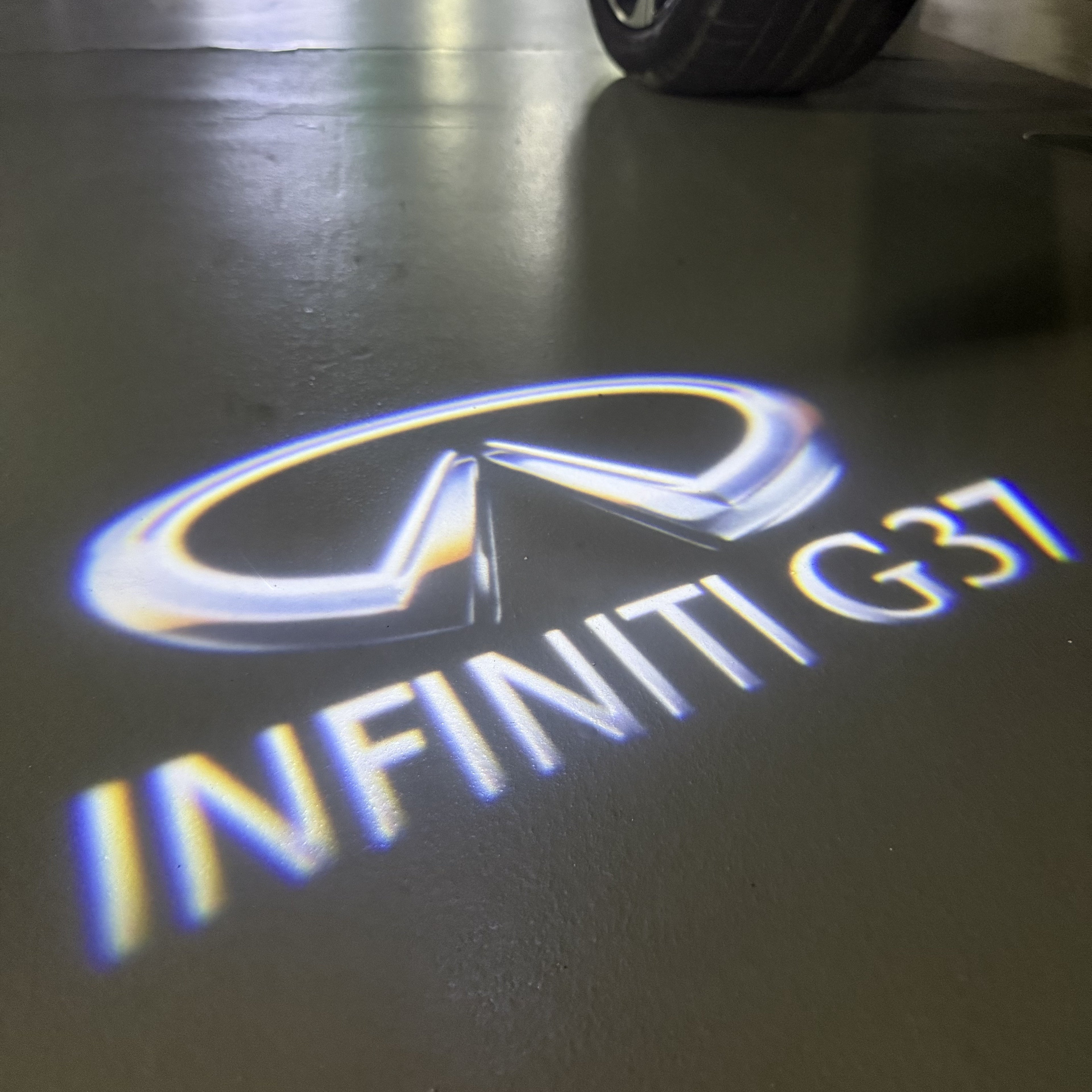 INFINITI  G37 LOGO PROJECROTR LIGHTS  (quantity 1 = 1 sets/2 door lights)Nr.74A64